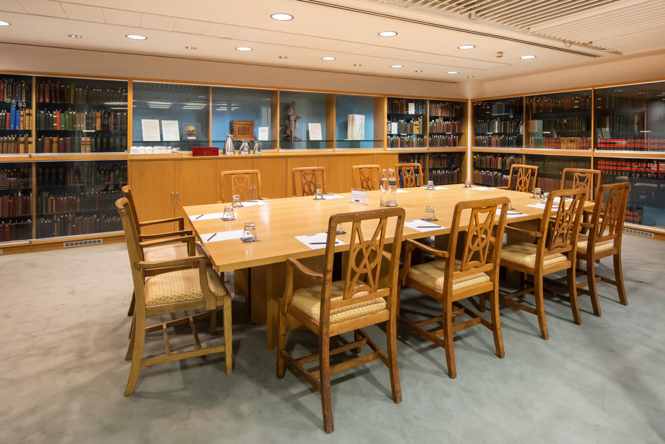 Heritage Centre conference room with wooden table, ideal for professional meetings.