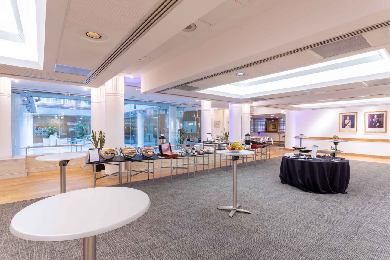 Cavendish Room event space with high-top tables, perfect for meetings and receptions.