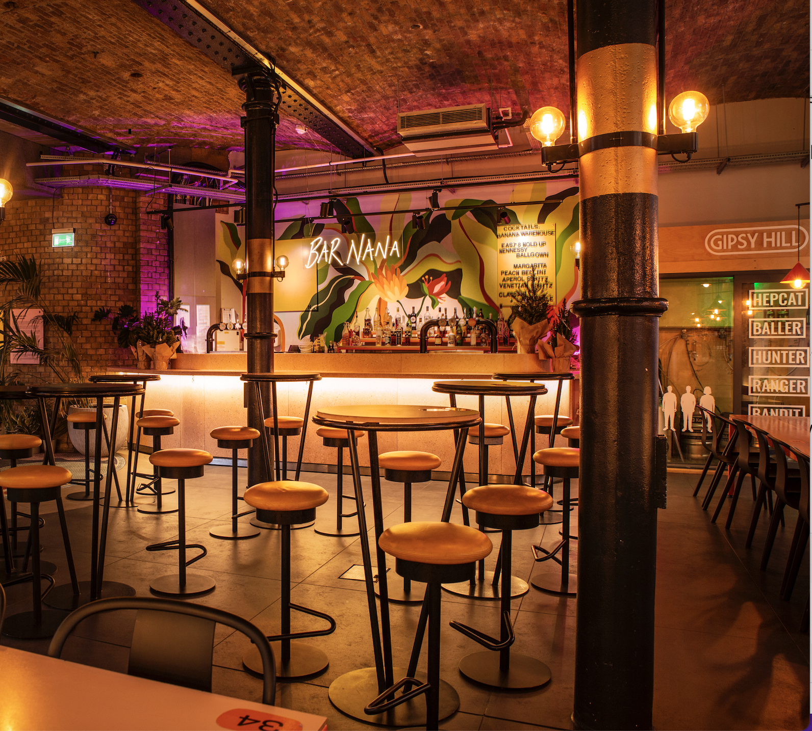 Bar Nana in Seven Dials Market with tropical mural, perfect for social events and gatherings.
