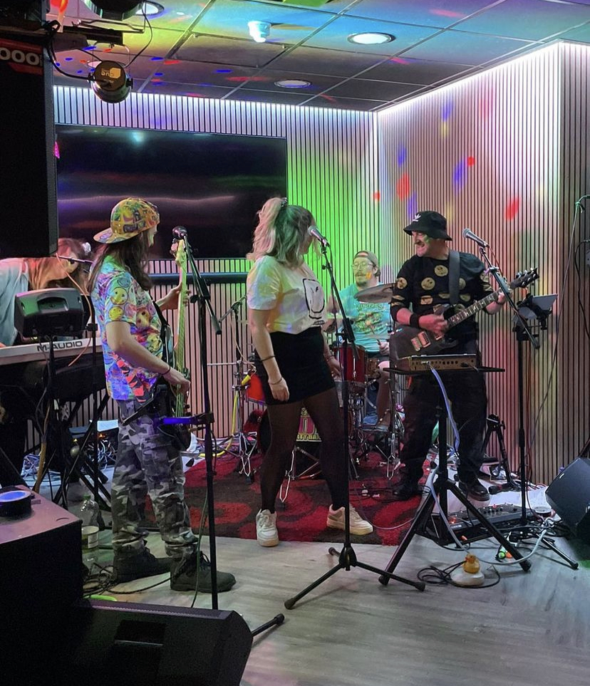 Lively band performing at PSA Performance Centre sports bar for events and gatherings.