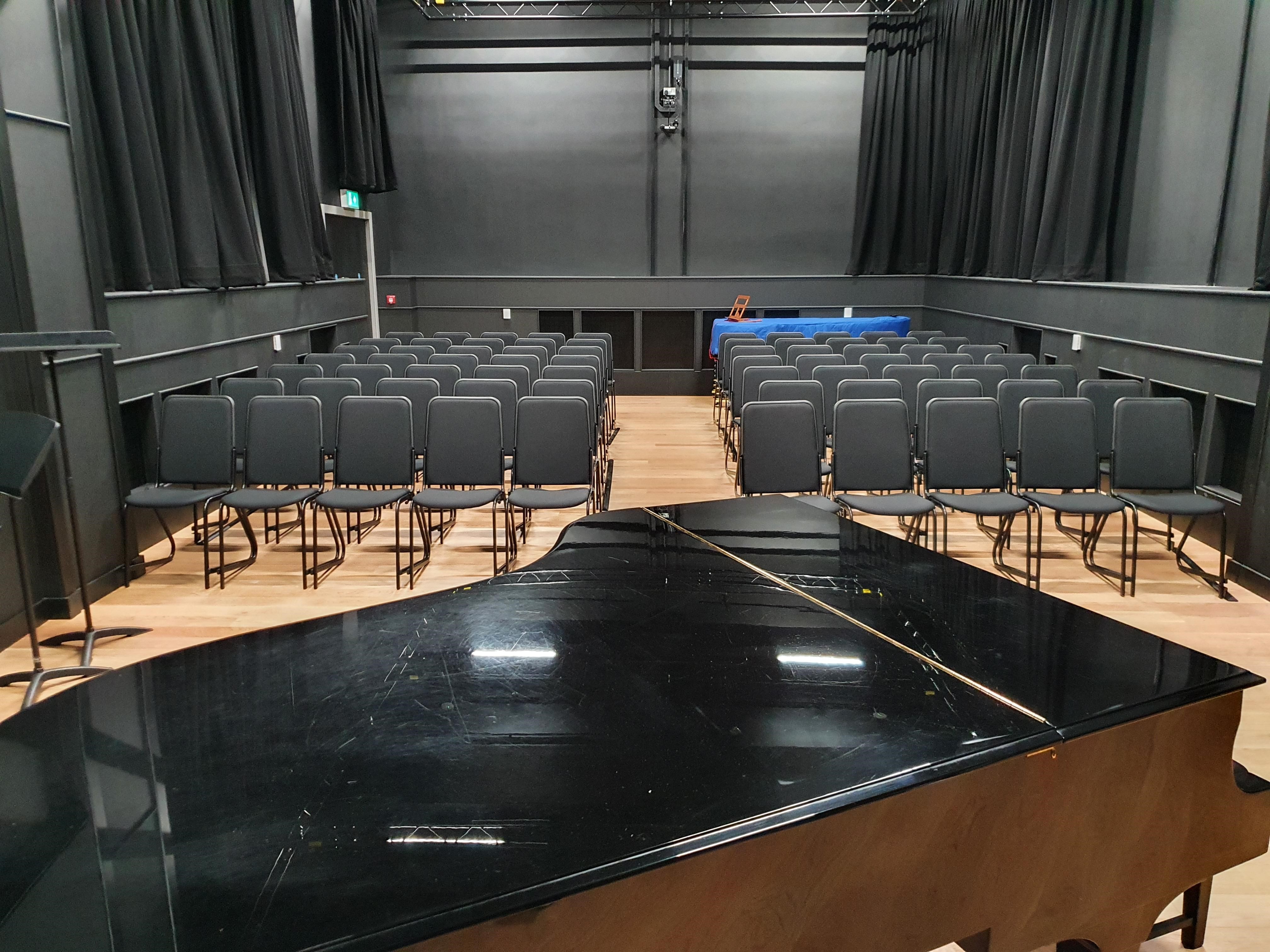Performance Studio at Royal College of Music with grand piano, ideal for performances and events.