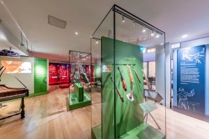 RCM Museum exhibition space with glass displays, ideal for workshops and networking events.