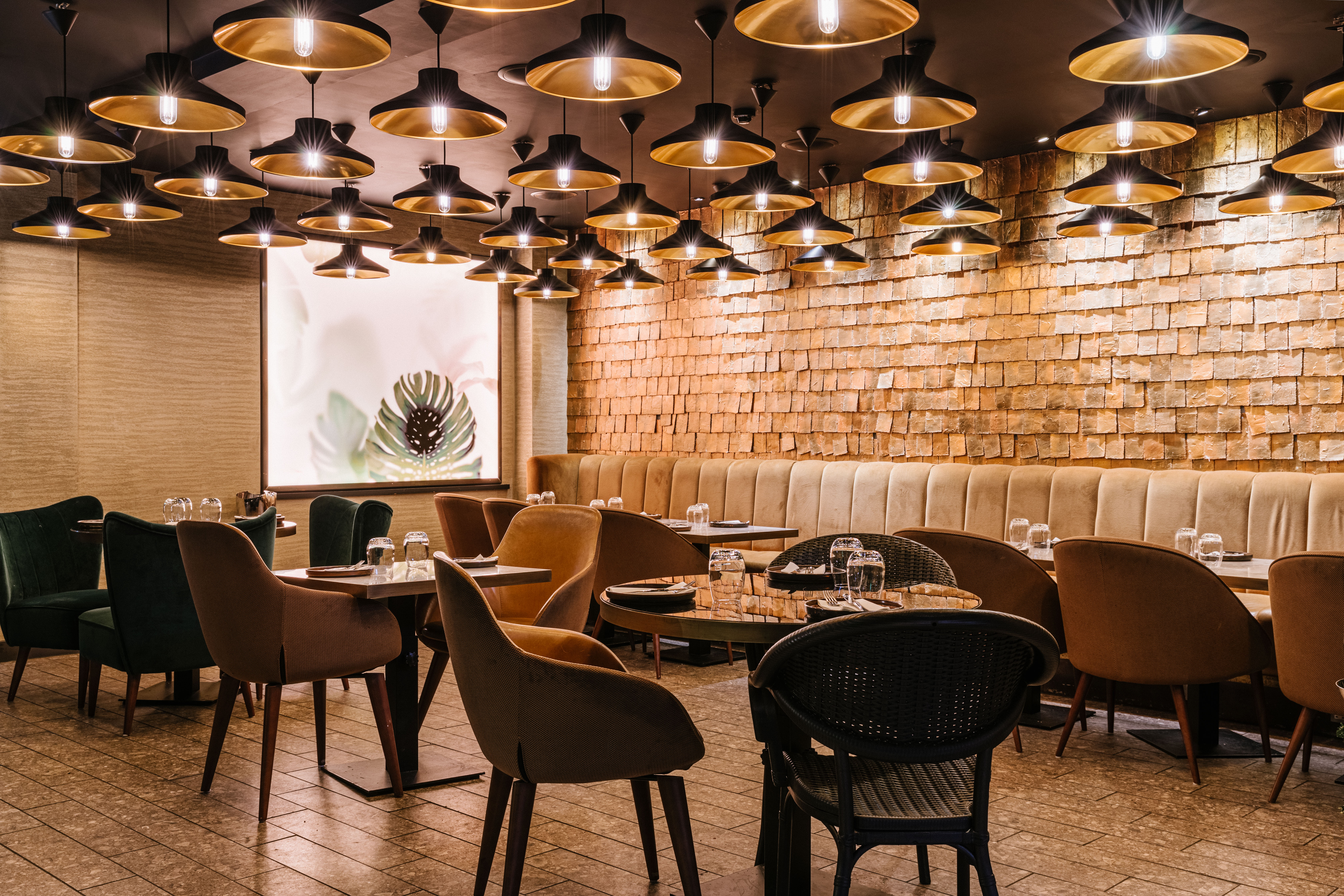 Stylish restaurant interior in Farzi London, perfect for intimate gatherings and upscale dining.