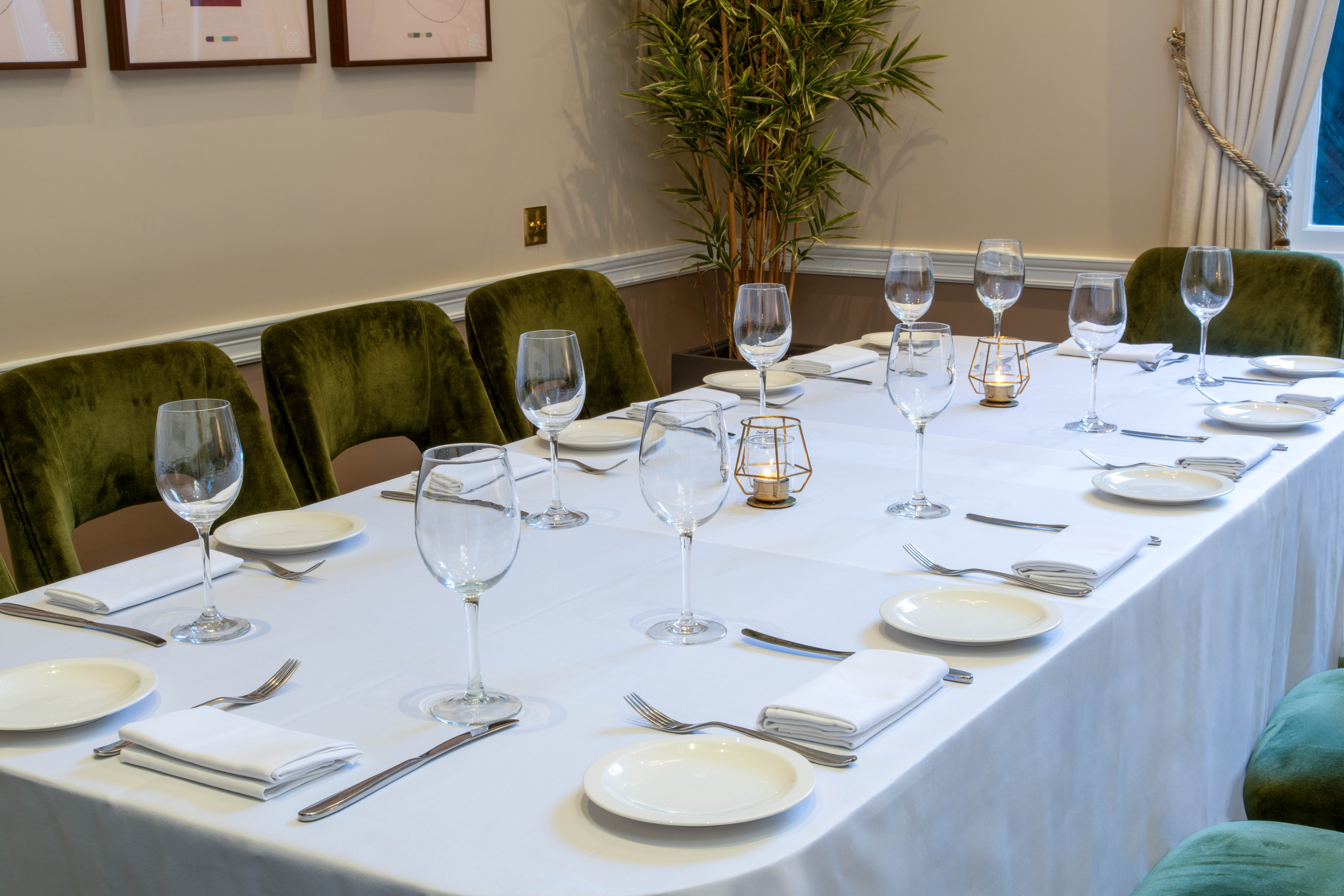 Elegant dining table setup for intimate corporate dinner at Club Priv'e.