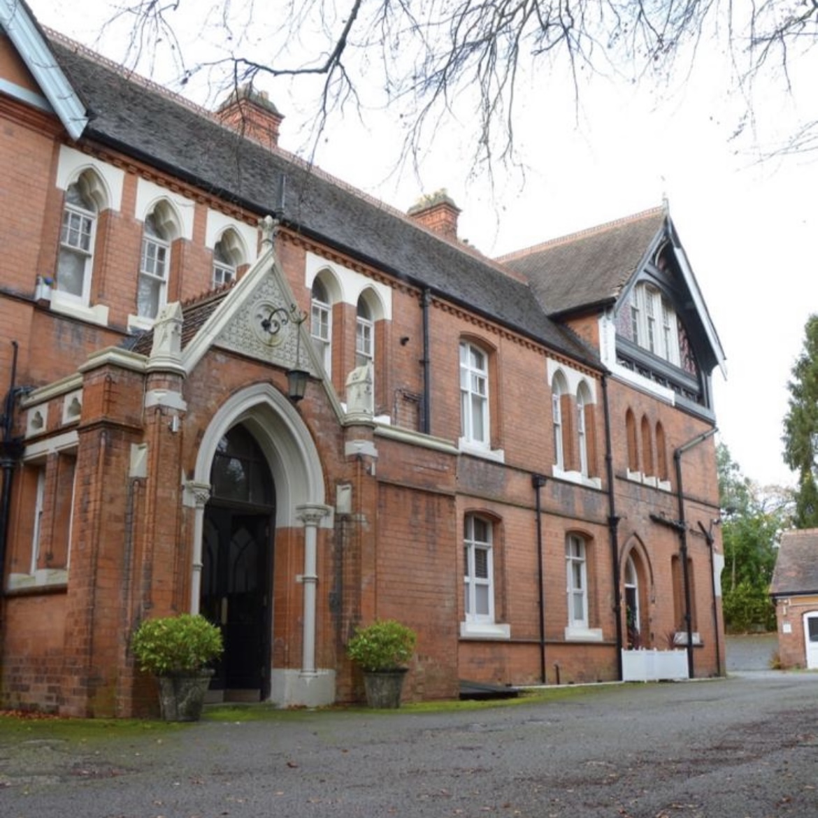 Historic Berrow Court venue with distinctive architecture for meetings and events.
