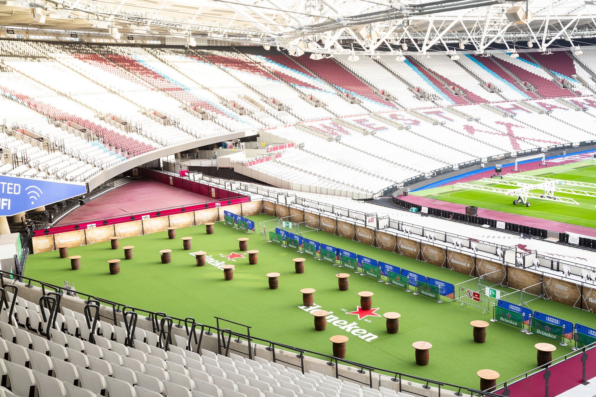 Versatile event space at London Stadium with green turf, ideal for corporate gatherings.