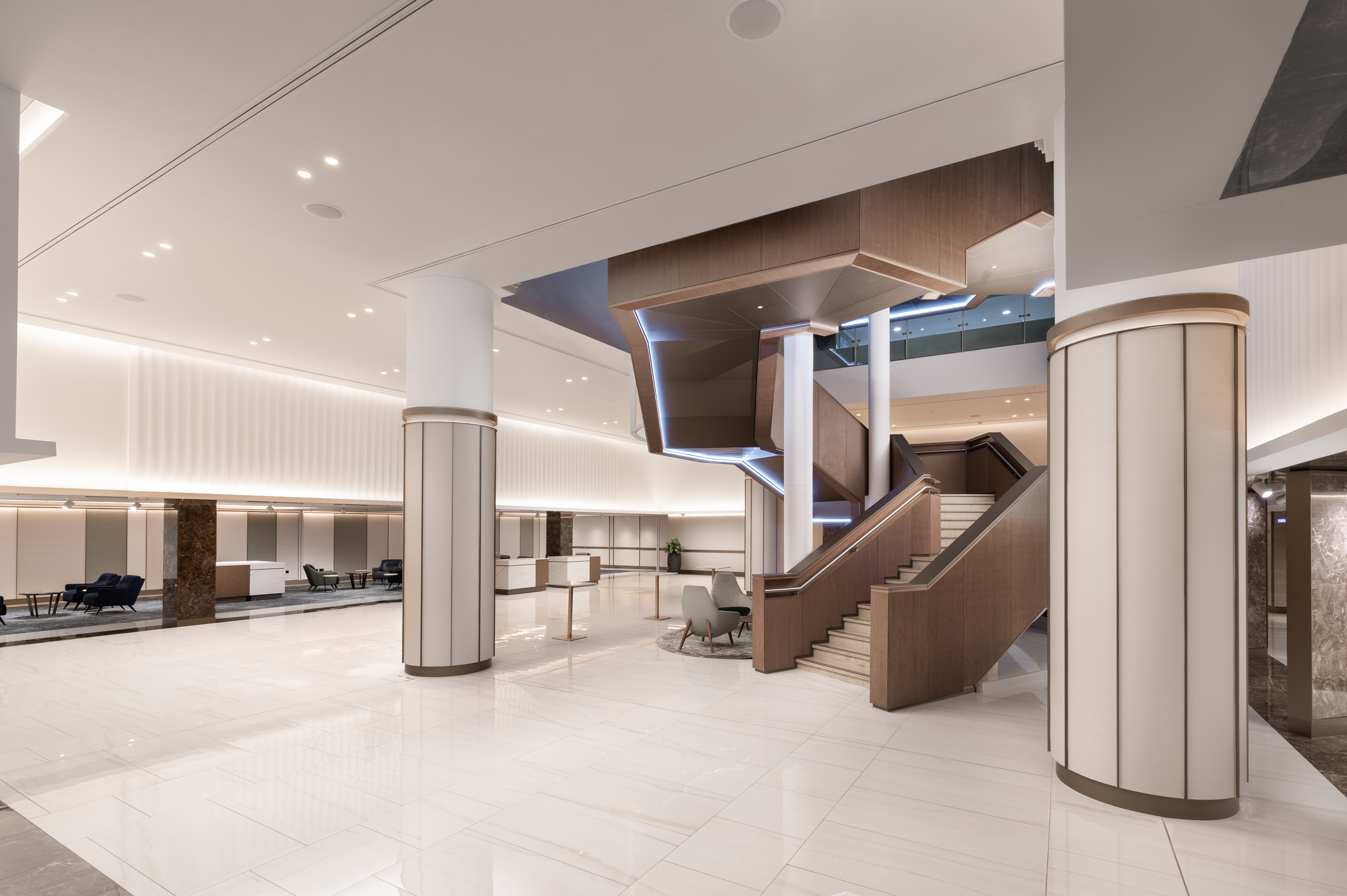 West Wing Foyer Meeting Rooms at Hilton London Metropole, elegant staircase, event venue.