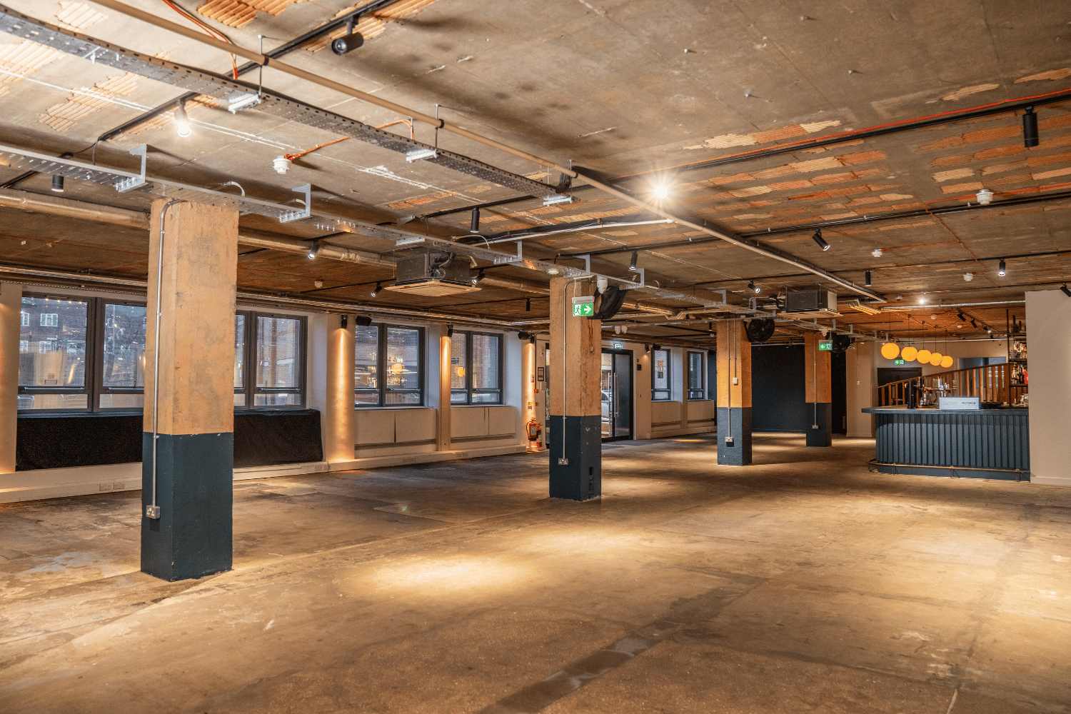 Versatile industrial event space with natural light at FACTORY 15 Bar, Barking.