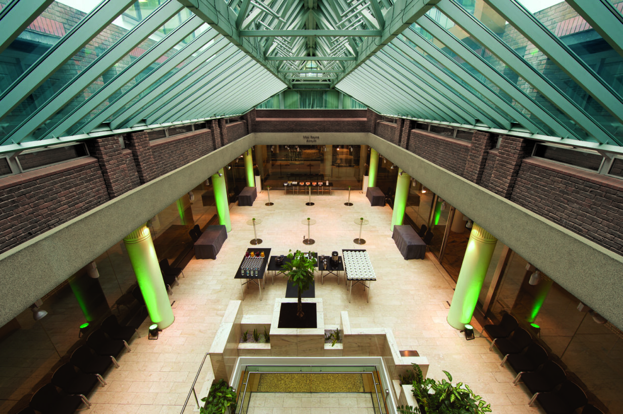 Max Rayne Atrium with glass ceiling, perfect for networking and social events.