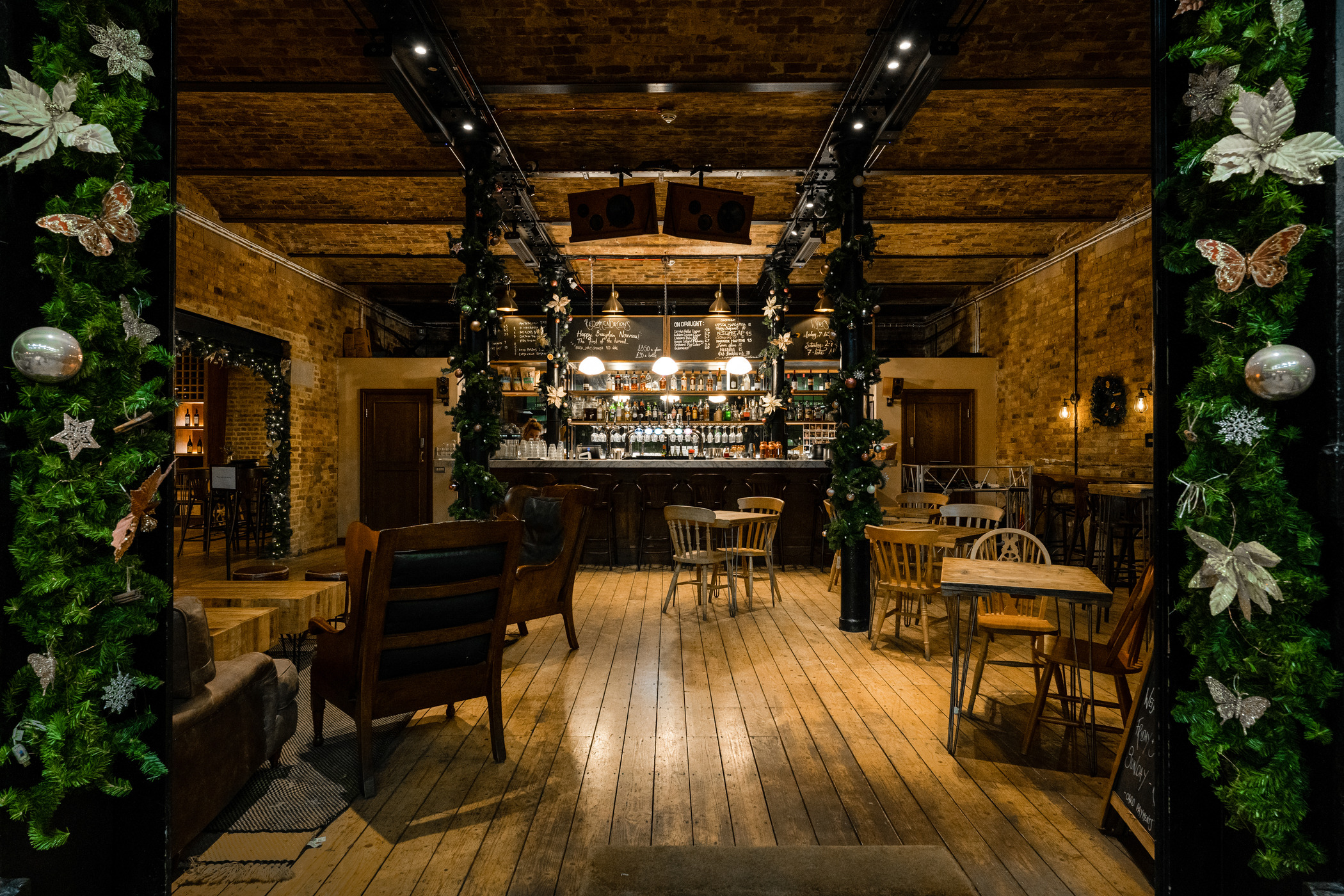 Cozy dining room with rustic decor, ideal for holiday parties and intimate gatherings.