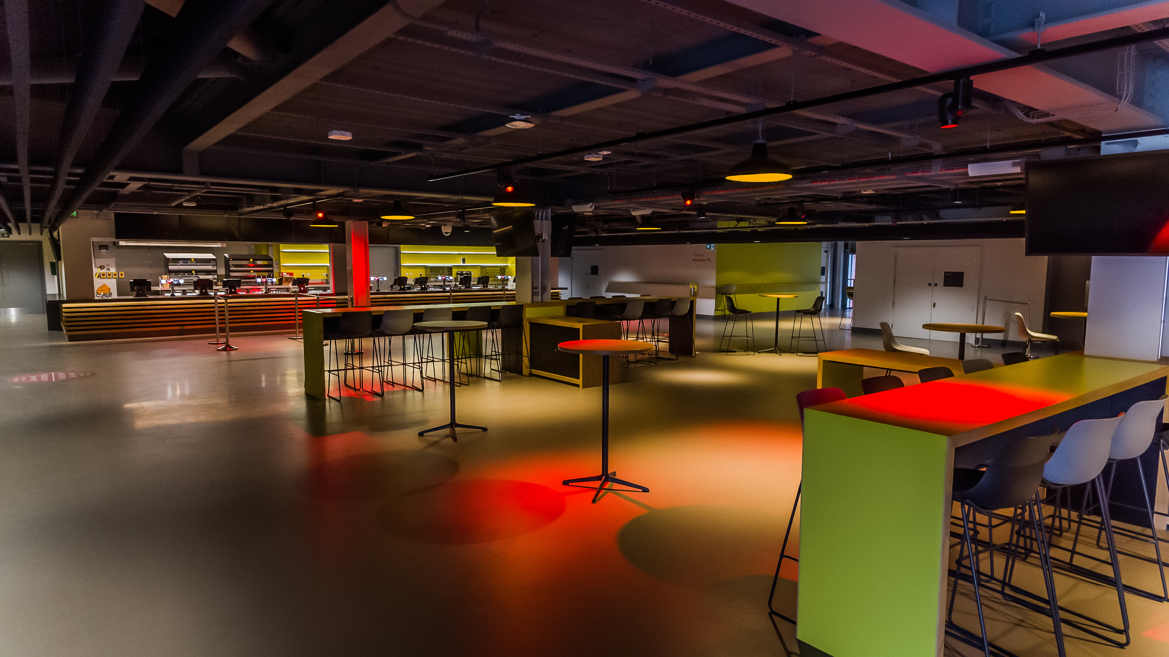 Modern event space at Brentford FC with vibrant colors, ideal for networking and workshops.