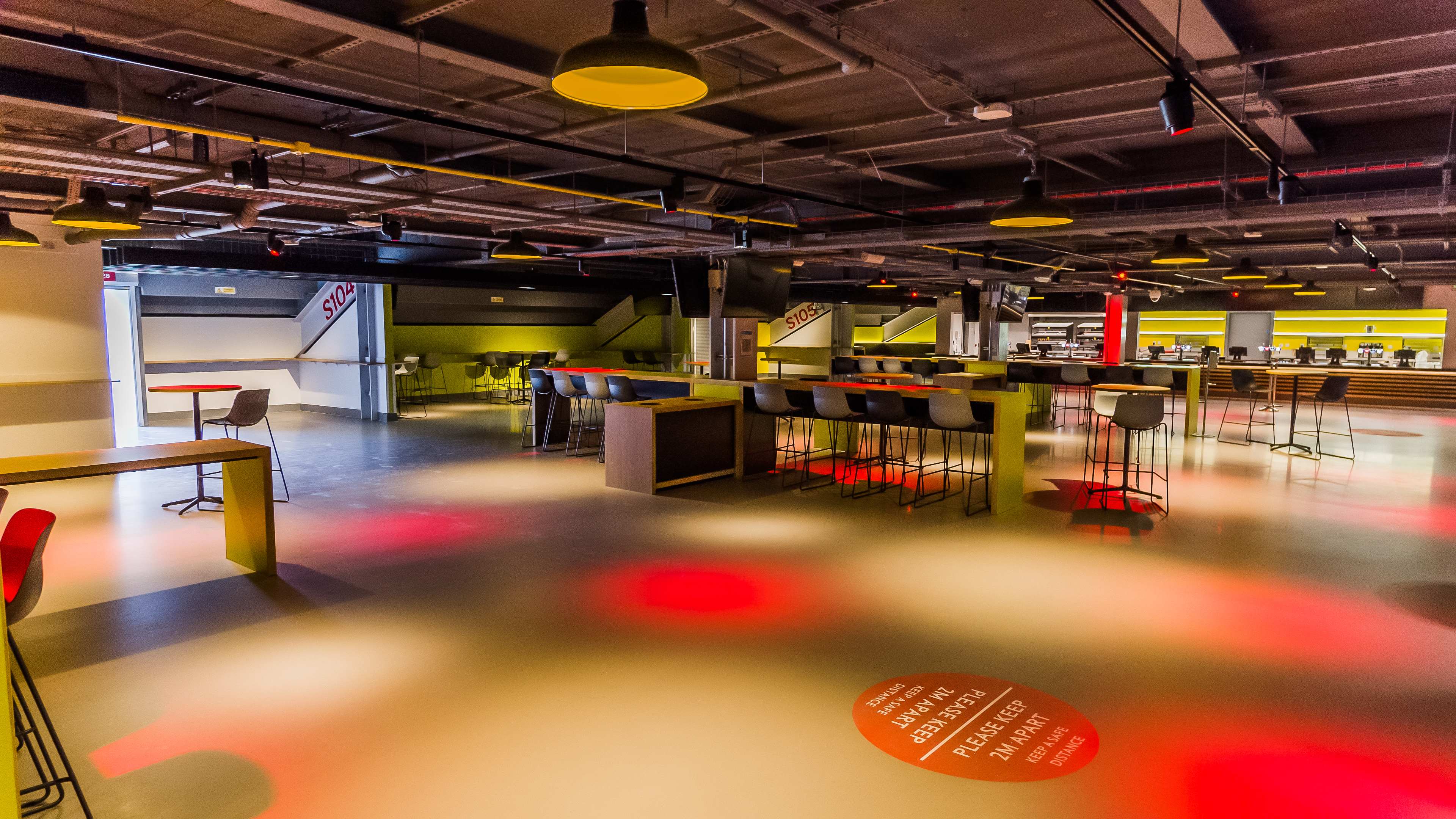 Modern event space at Brentford FC with flexible seating for networking and workshops.
