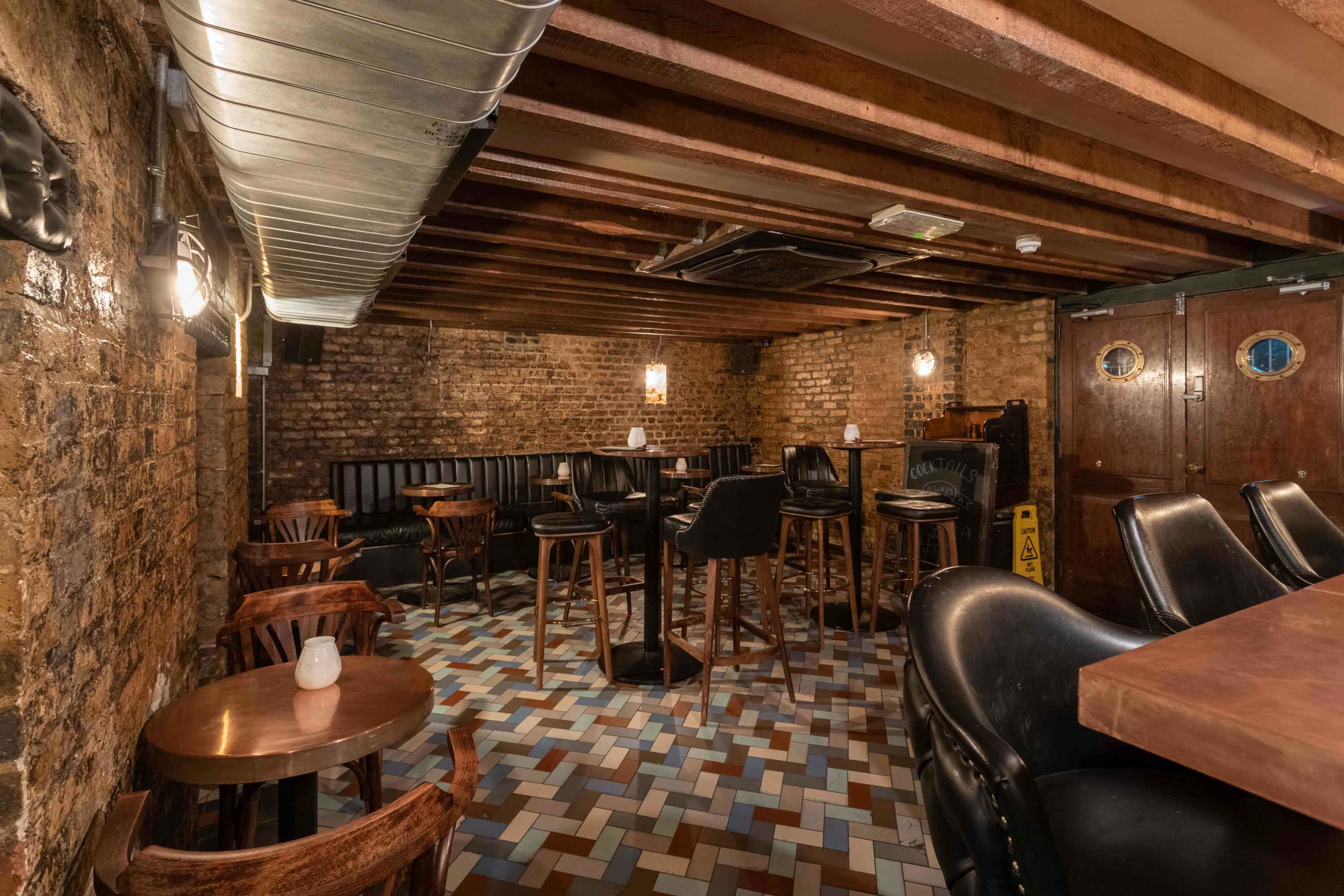 Cozy venue with exposed brick for small gatherings and private events.