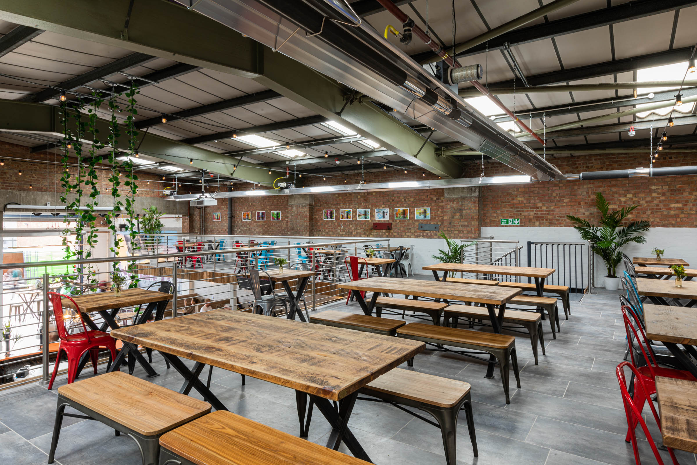 Versatile event space at Fourpure Taproom with industrial design and natural light.