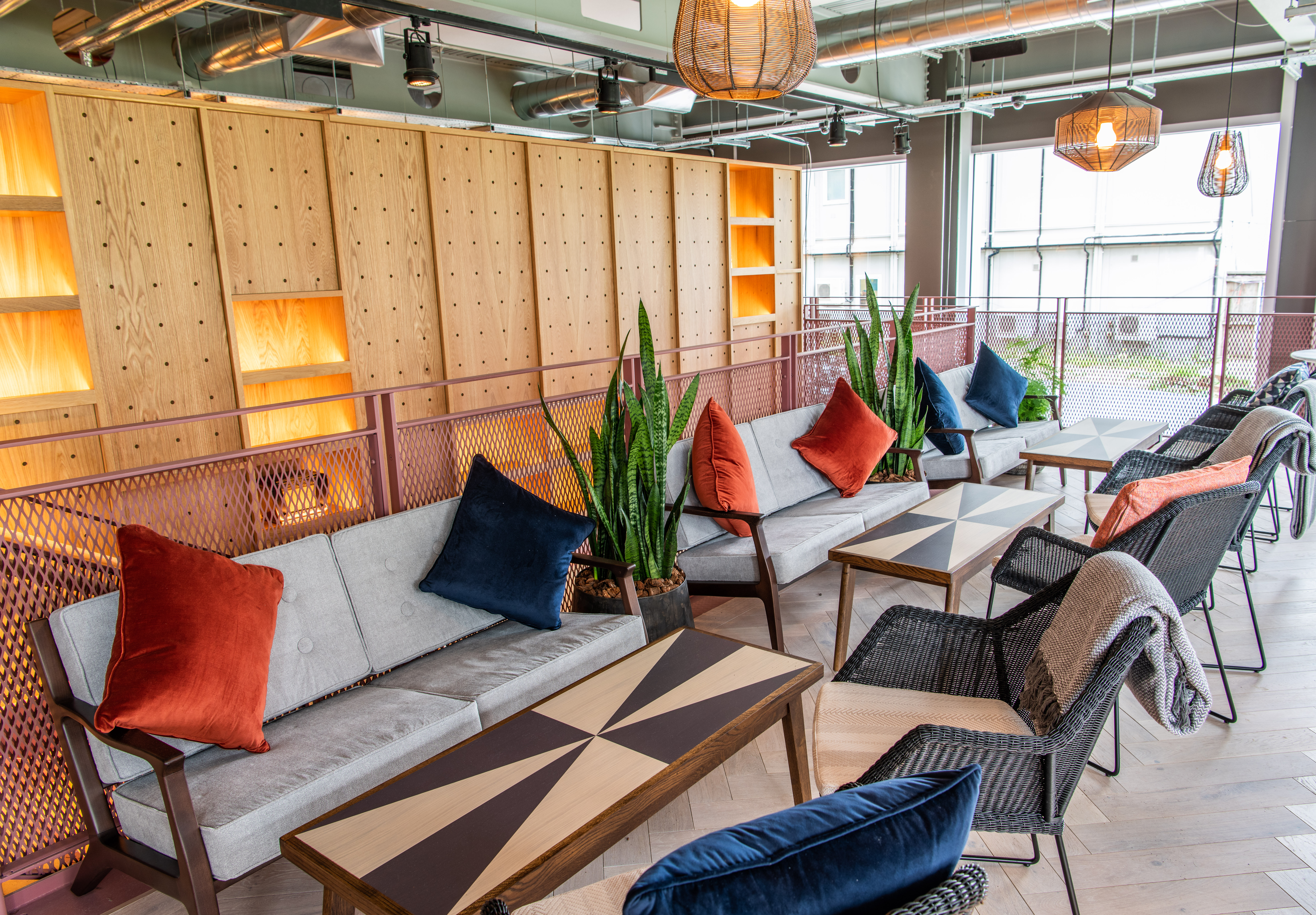 Stylish lounge area in Babel Beerhouse for networking events with vibrant decor.