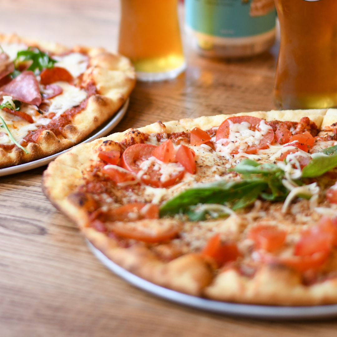 Vibrant pizza spread at Babel Beerhouse for casual networking and team-building events.