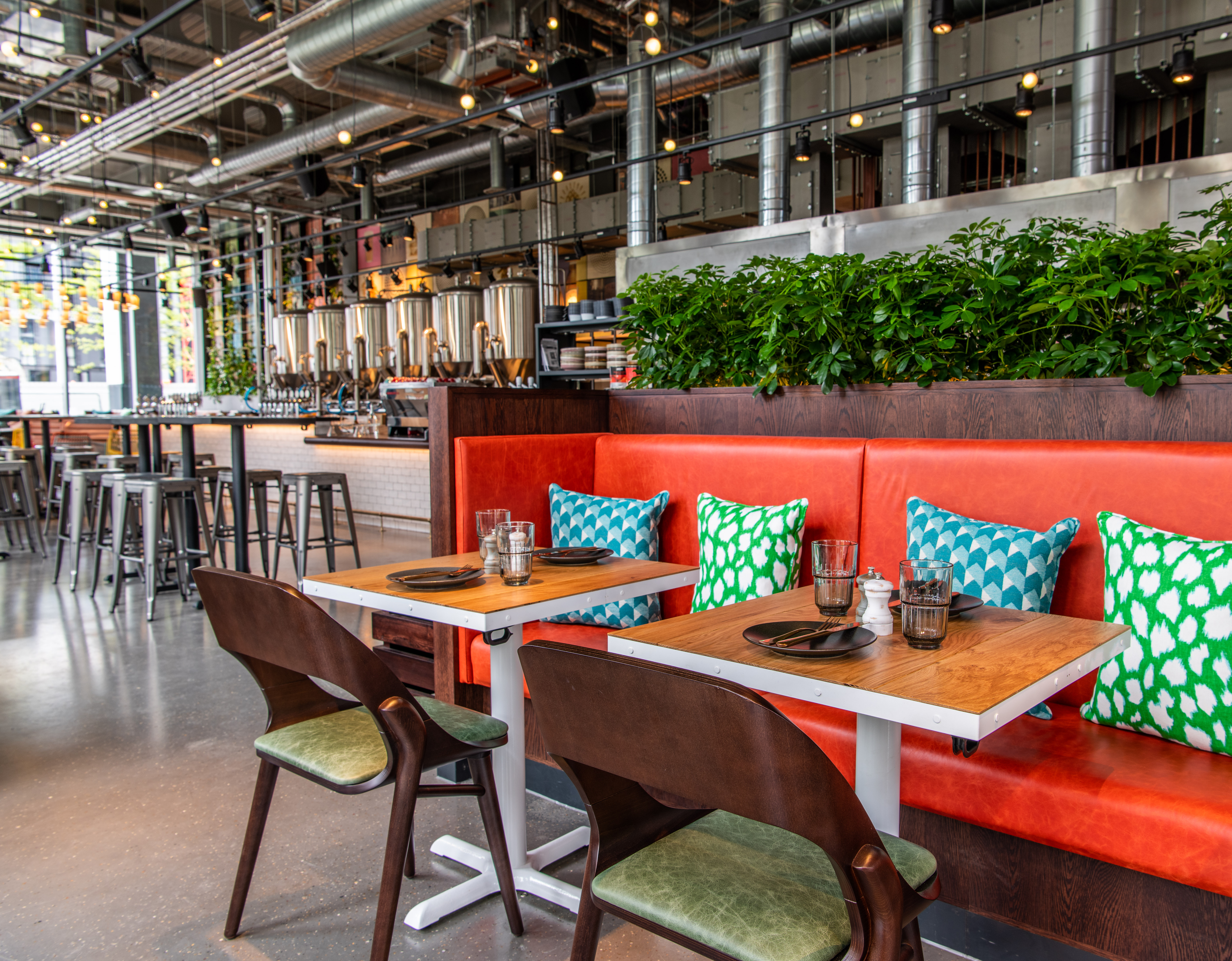 Modern dining space at Babel Beerhouse, perfect for networking events and casual meetings.