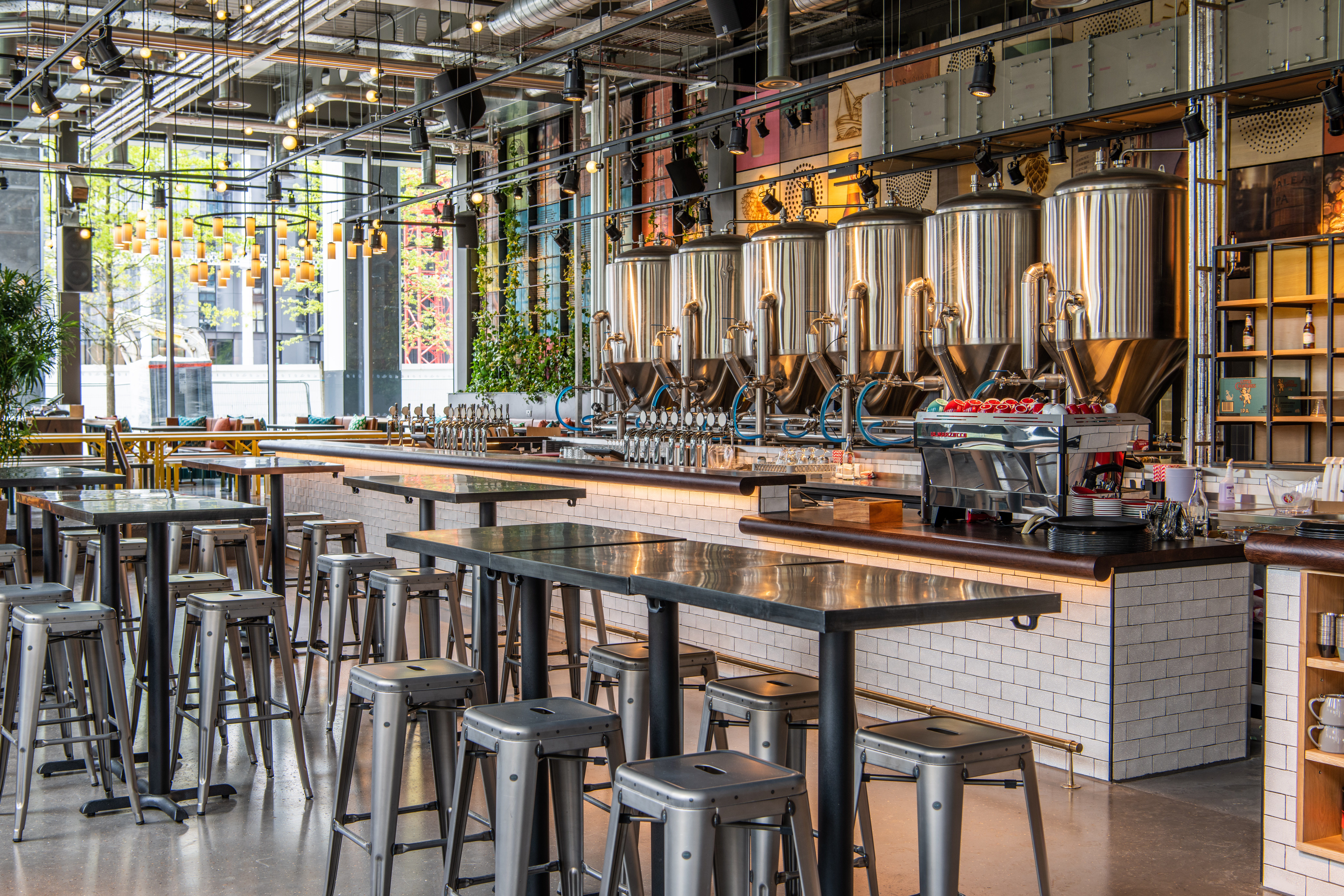 Modern industrial bar at Babel Beerhouse, perfect for networking events and gatherings.