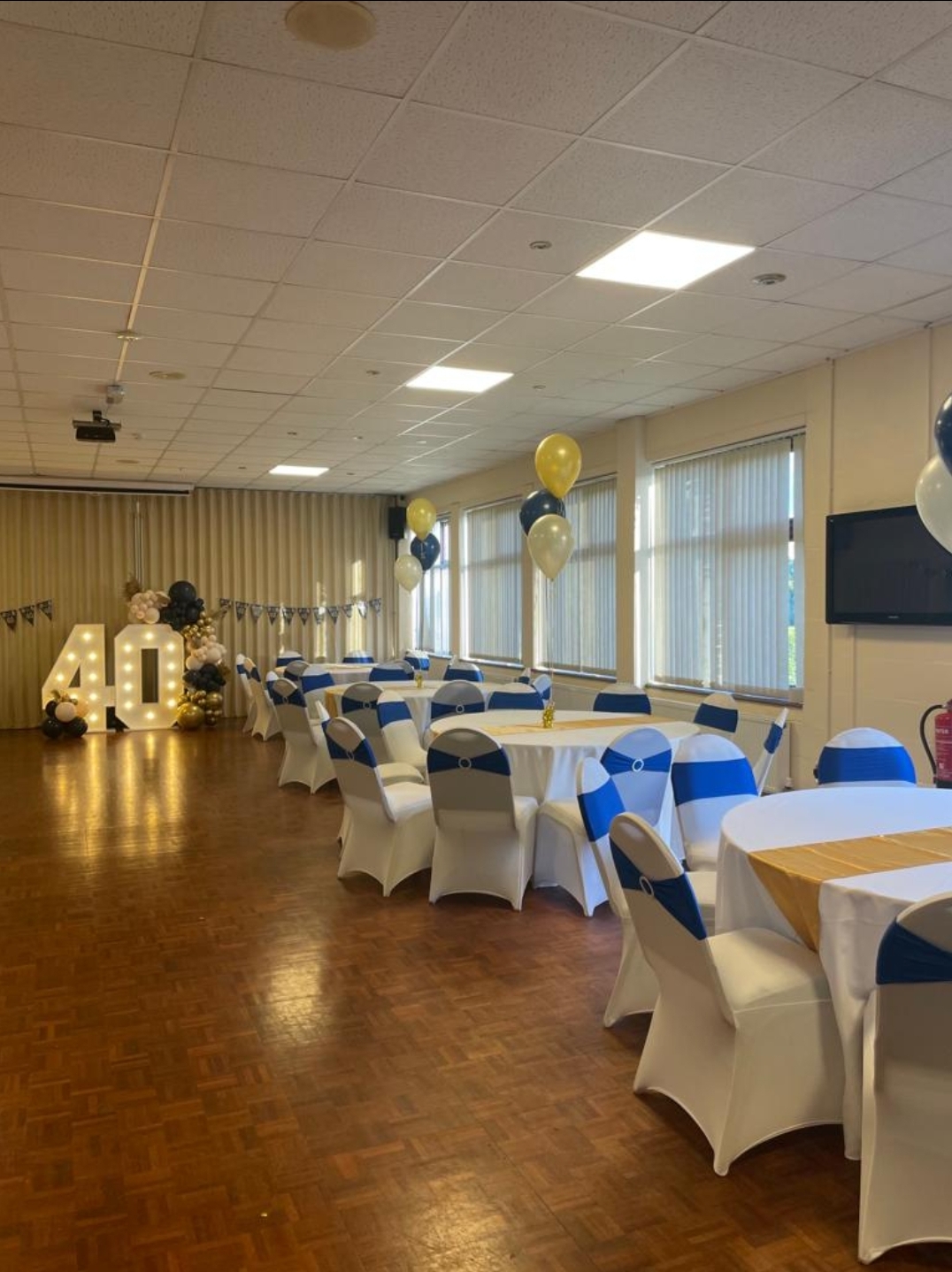 Elegant event space in Glebelands for a 40th birthday celebration with blue accents.