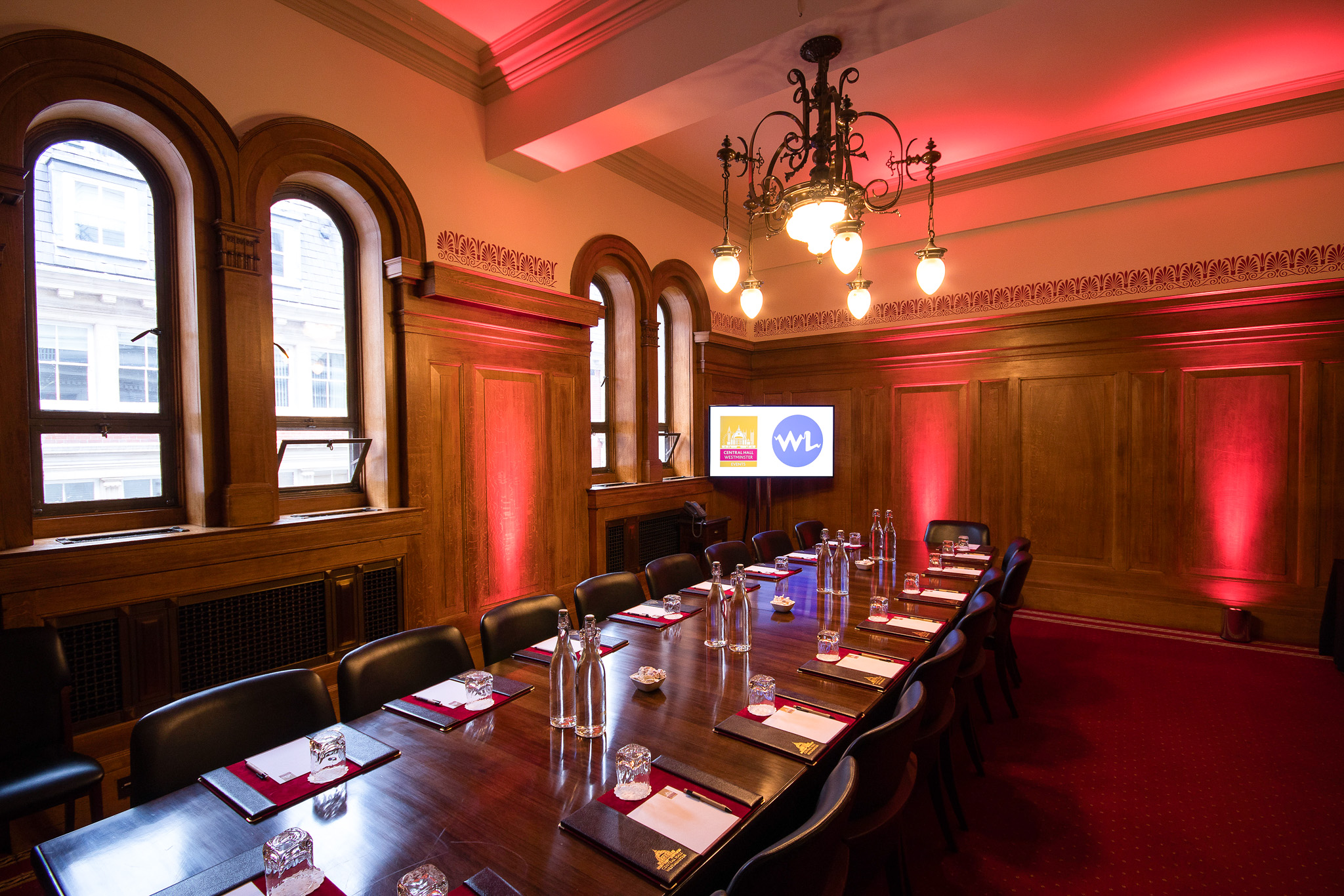 President's Room in Central Hall Westminster, elegant wooden paneling, corporate meeting space.