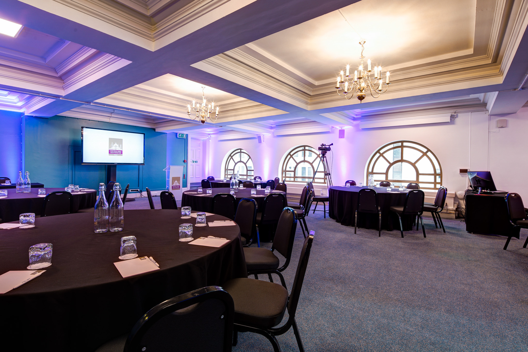 Donald English in Central Hall Westminster, a modern meeting space for professional events.
