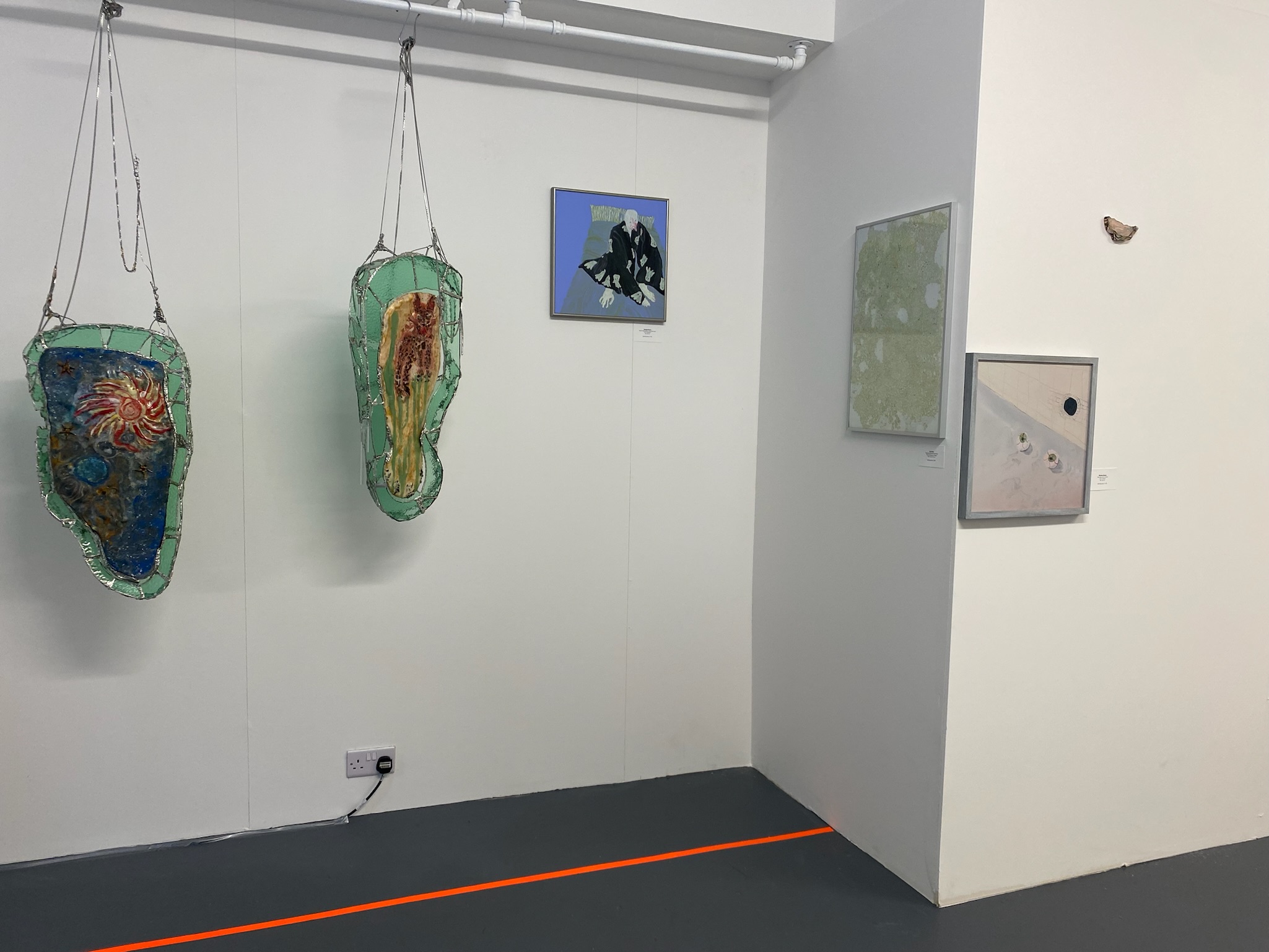 Large Gallery Room with vibrant contemporary art, perfect for networking events.