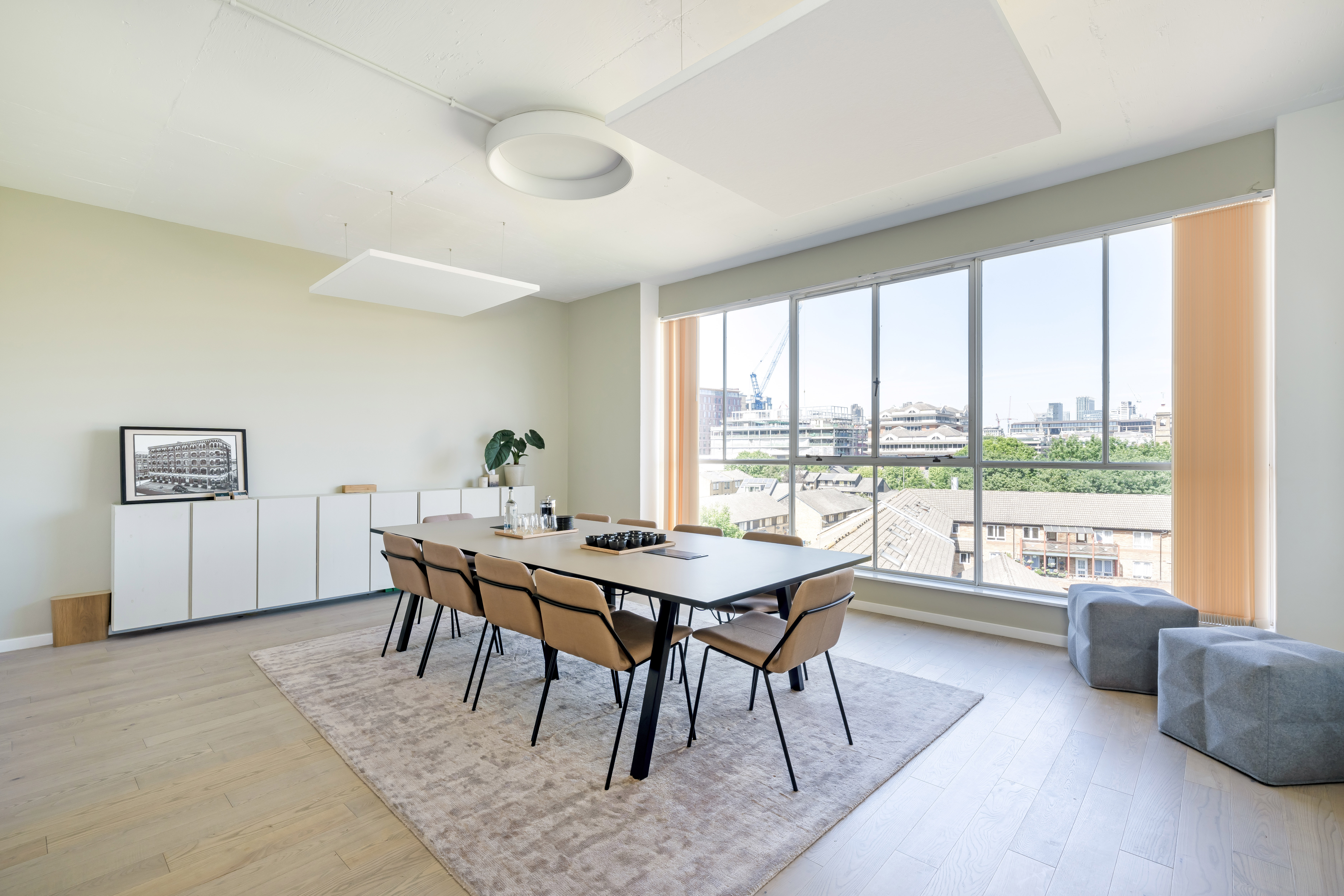 Menier Meeting Room with large windows, ideal for workshops and team meetings.