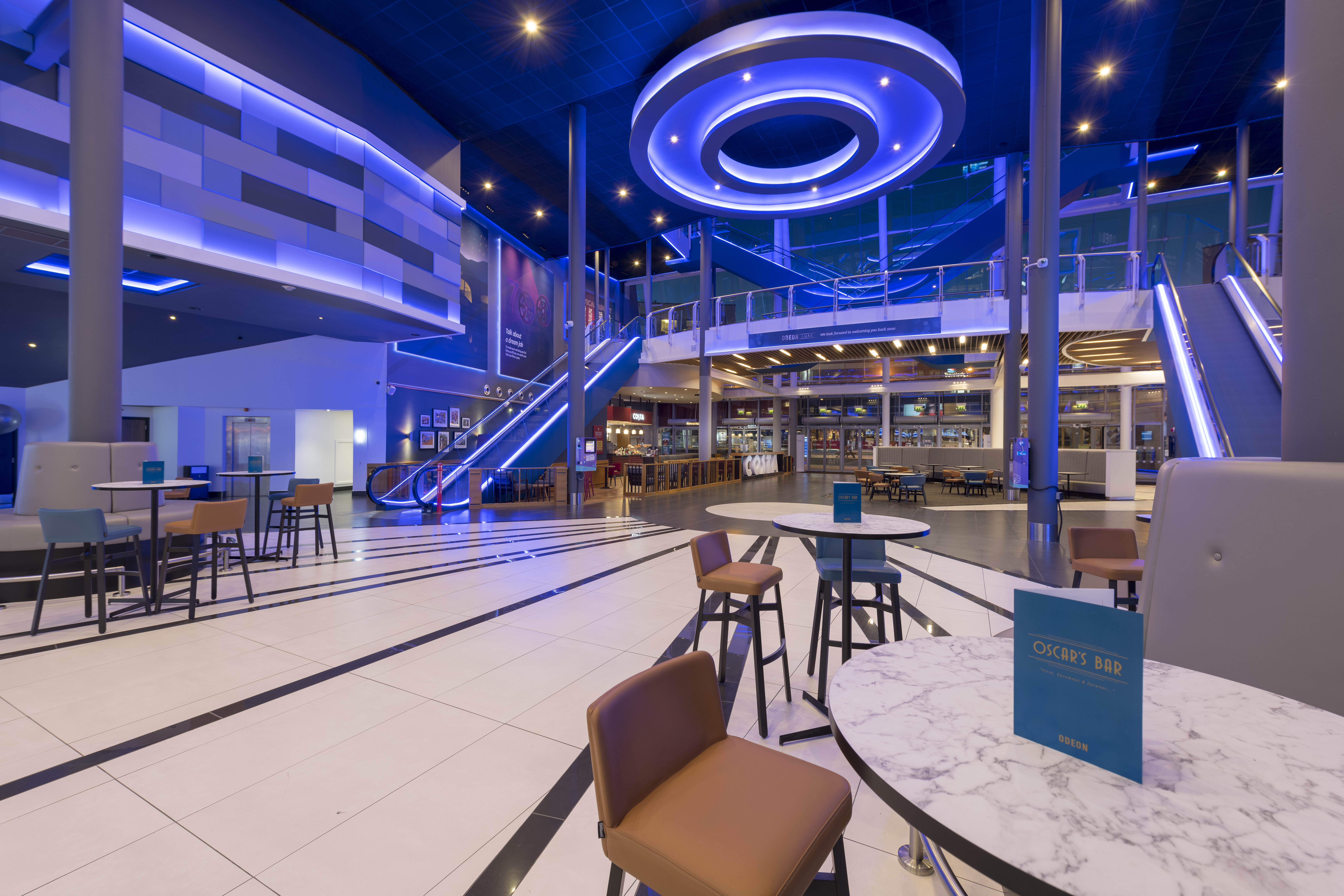 Modern event space at ODEON Luxe Birmingham with vibrant lighting and versatile seating.