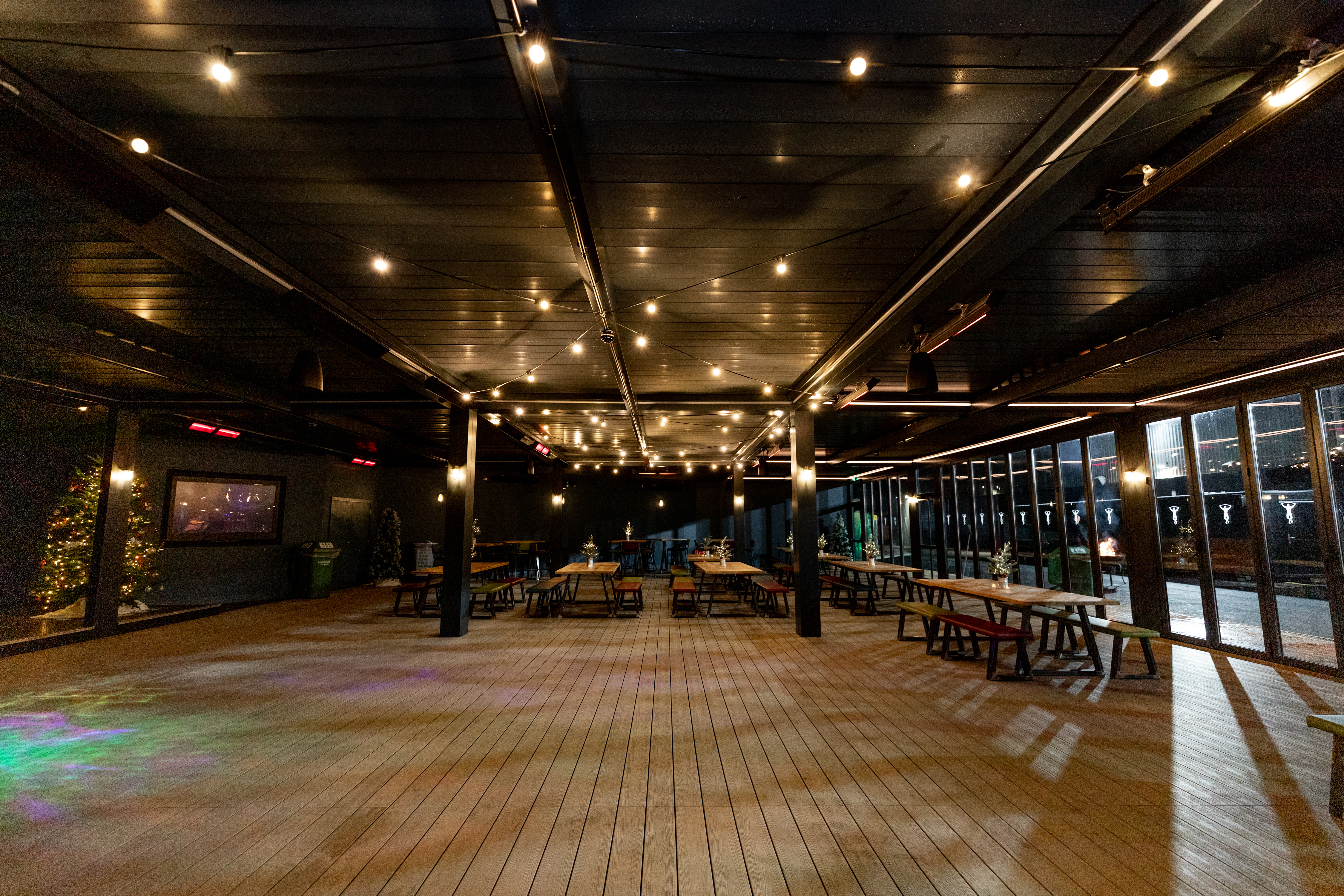 The North Village at Twickenham Stoop Stadium, versatile event space with string lights.