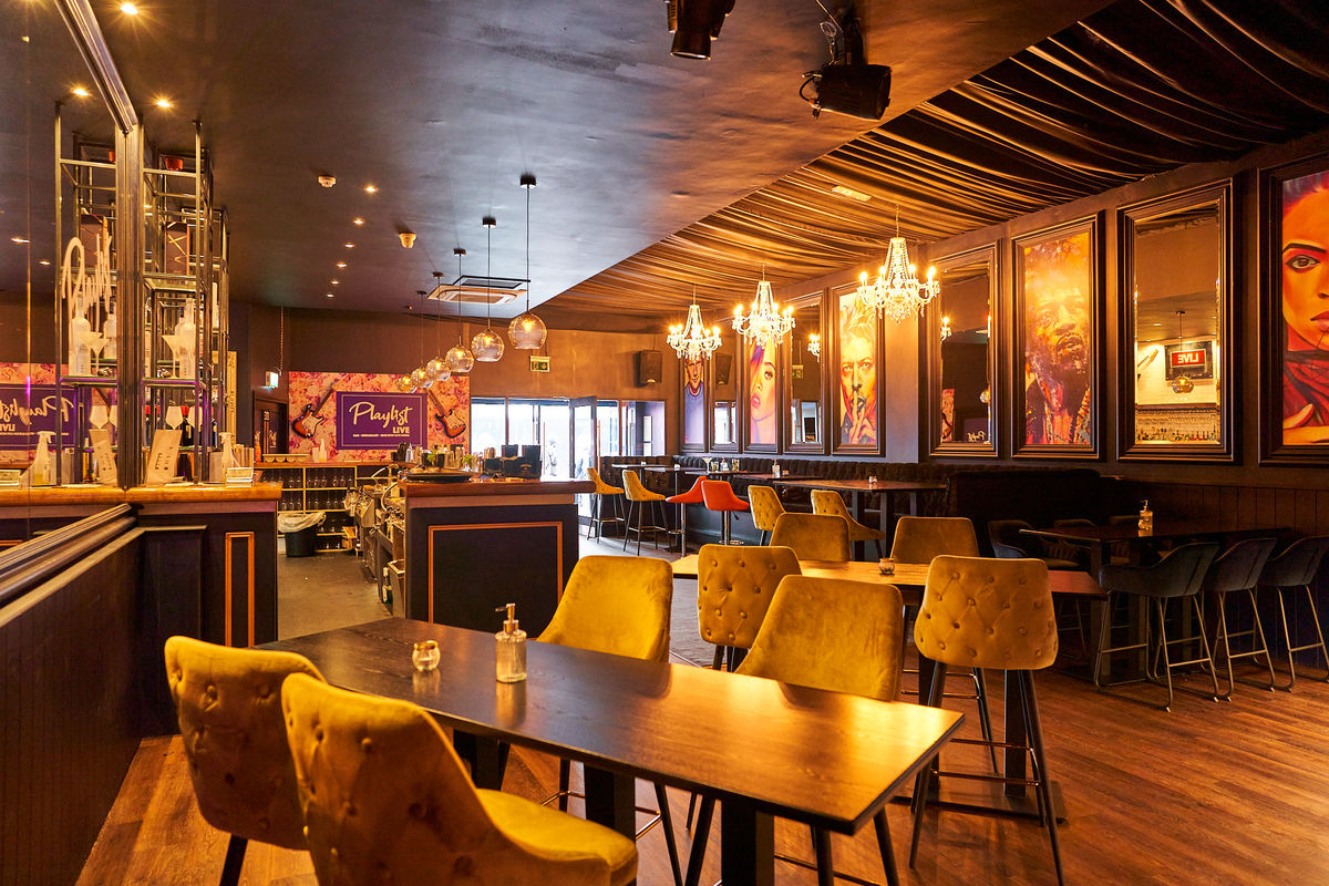 Stylish event space with modern decor for networking and celebrations at Playlist Live.