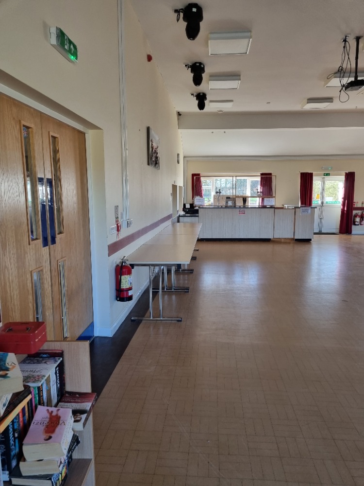 Windsor Hall in Skipsea Village: spacious event venue with wooden doors, ideal for gatherings.