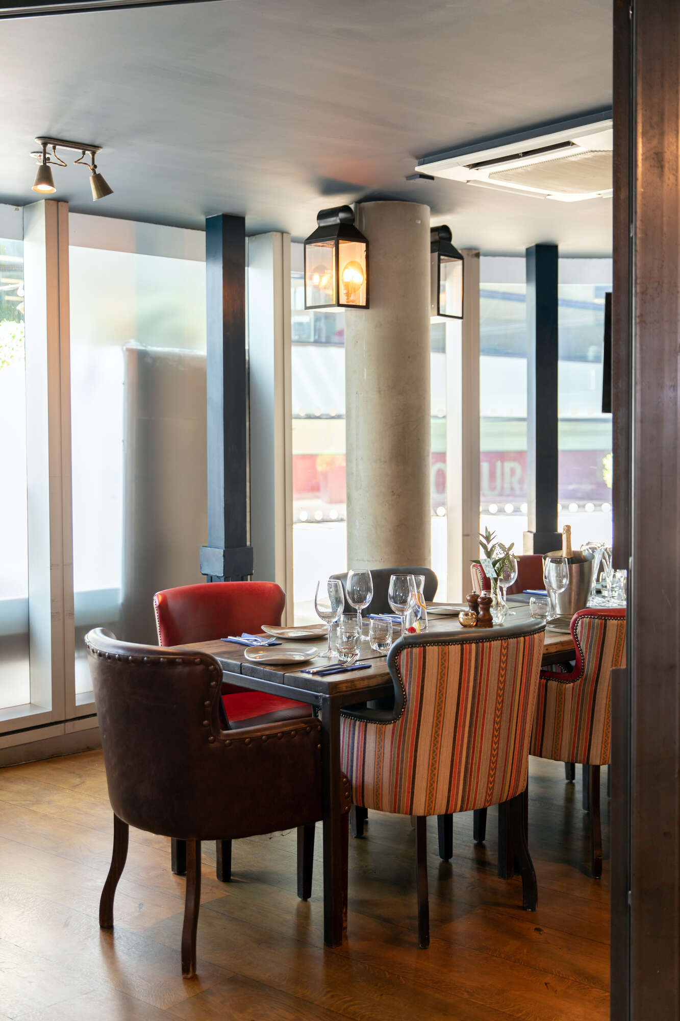 Stylish dining setup in The Cabin at The Oyster Shed for intimate events and meetings.