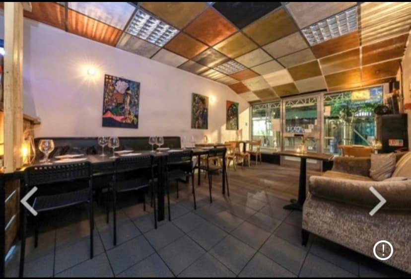 Stylish Dalston Lounge event space with unique ceiling, perfect for networking and intimate dinners.