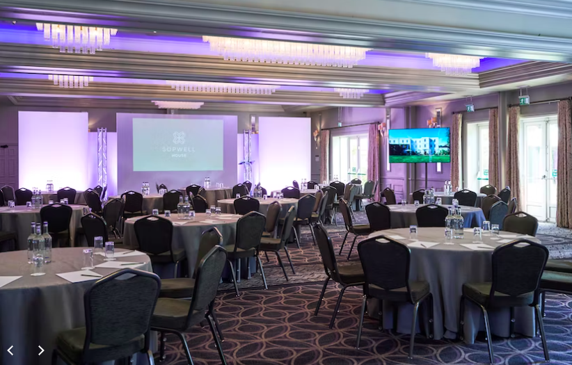 St Albans Suite at Sopwell House, elegant conference space with round tables and AV equipment.