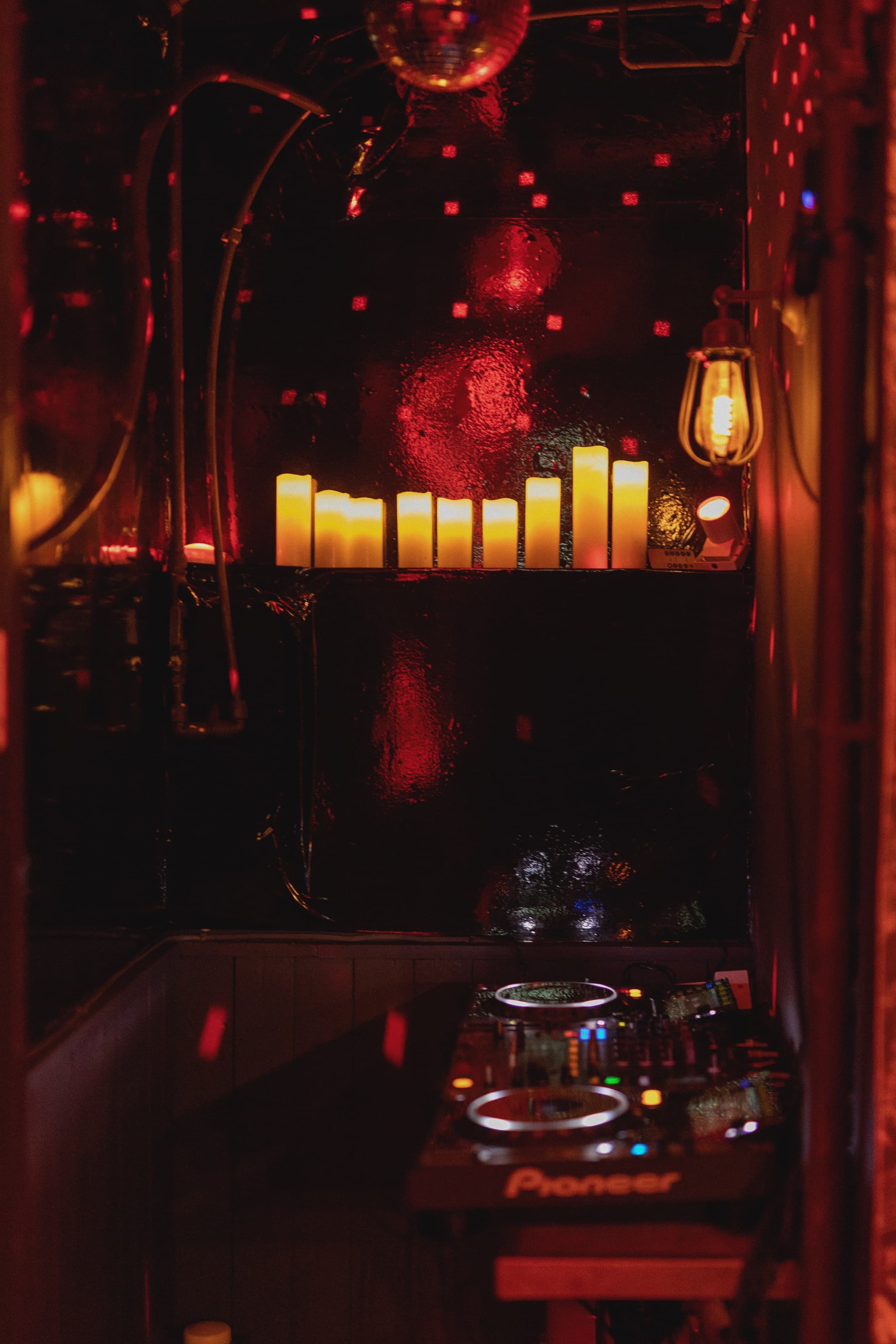 Moody Beasy Soho venue with candlelight ambiance for intimate gatherings and events.