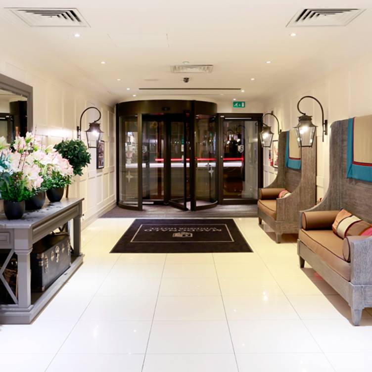 Caley's Brasserie entrance at Macdonald Windsor Hotel, elegant decor for events and meetings.