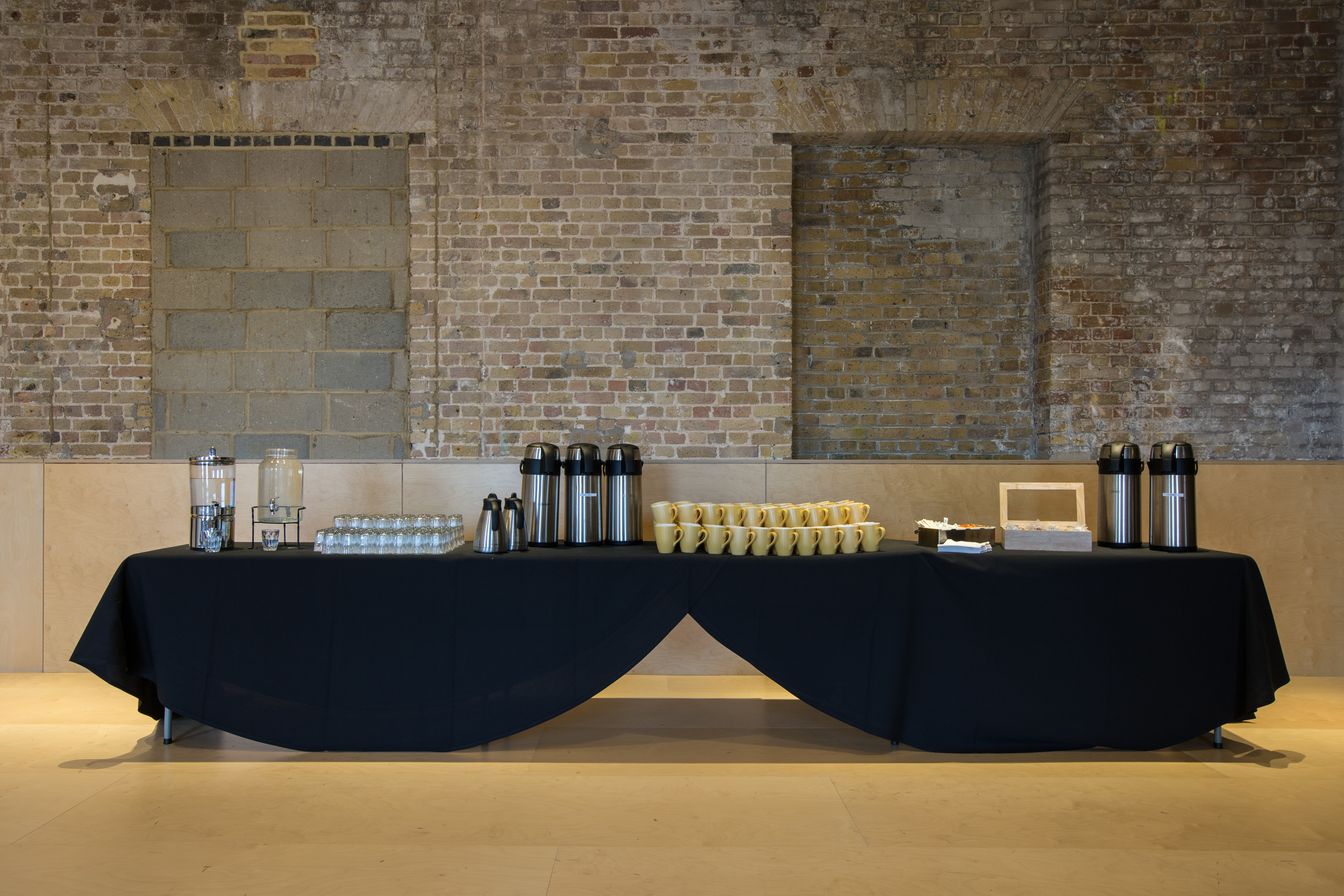 Coopers Studio refreshment station with coffee dispensers for networking event in Woolwich.