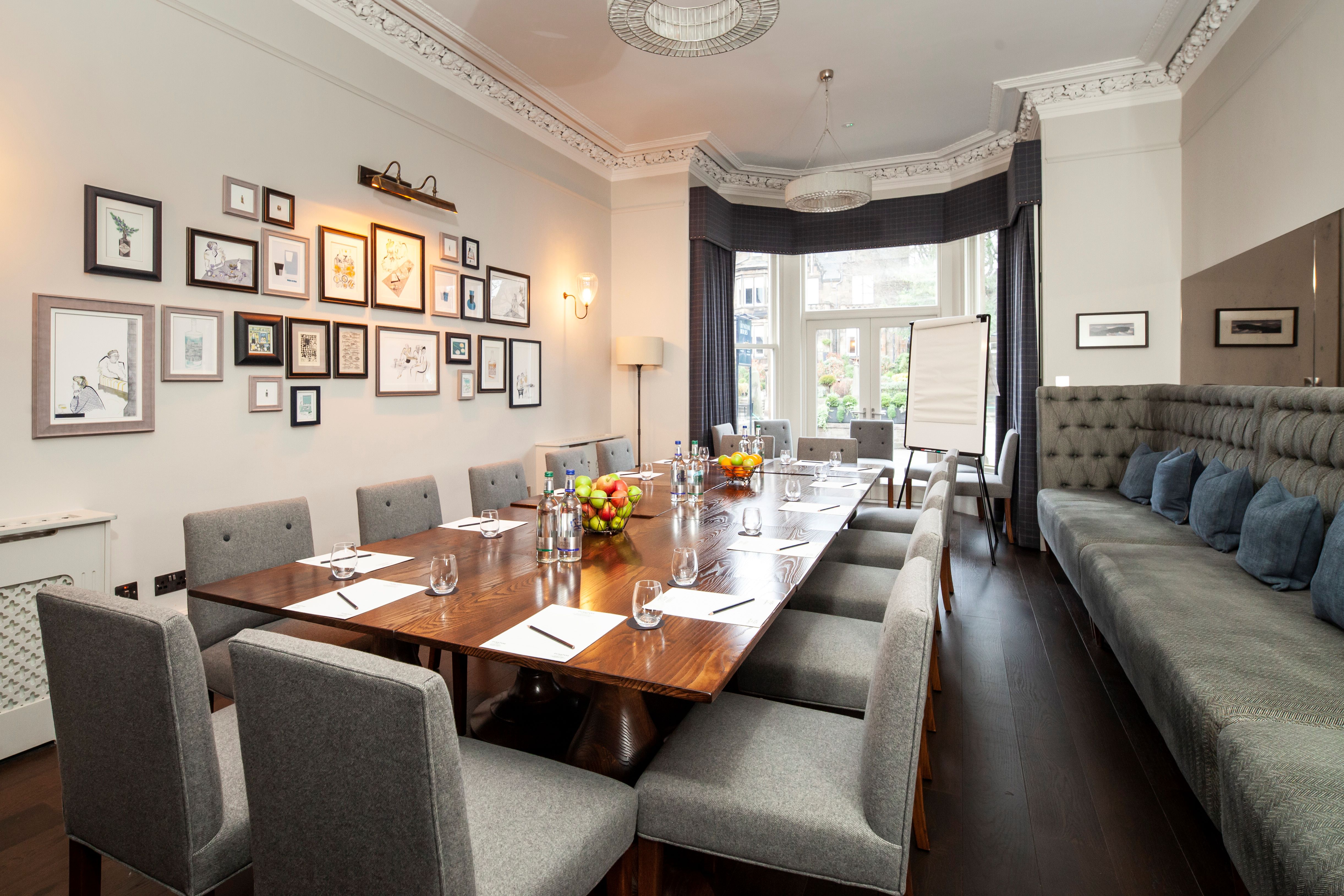 Intimate meeting room at Club Prive, The Roseate Edinburgh, perfect for small events.