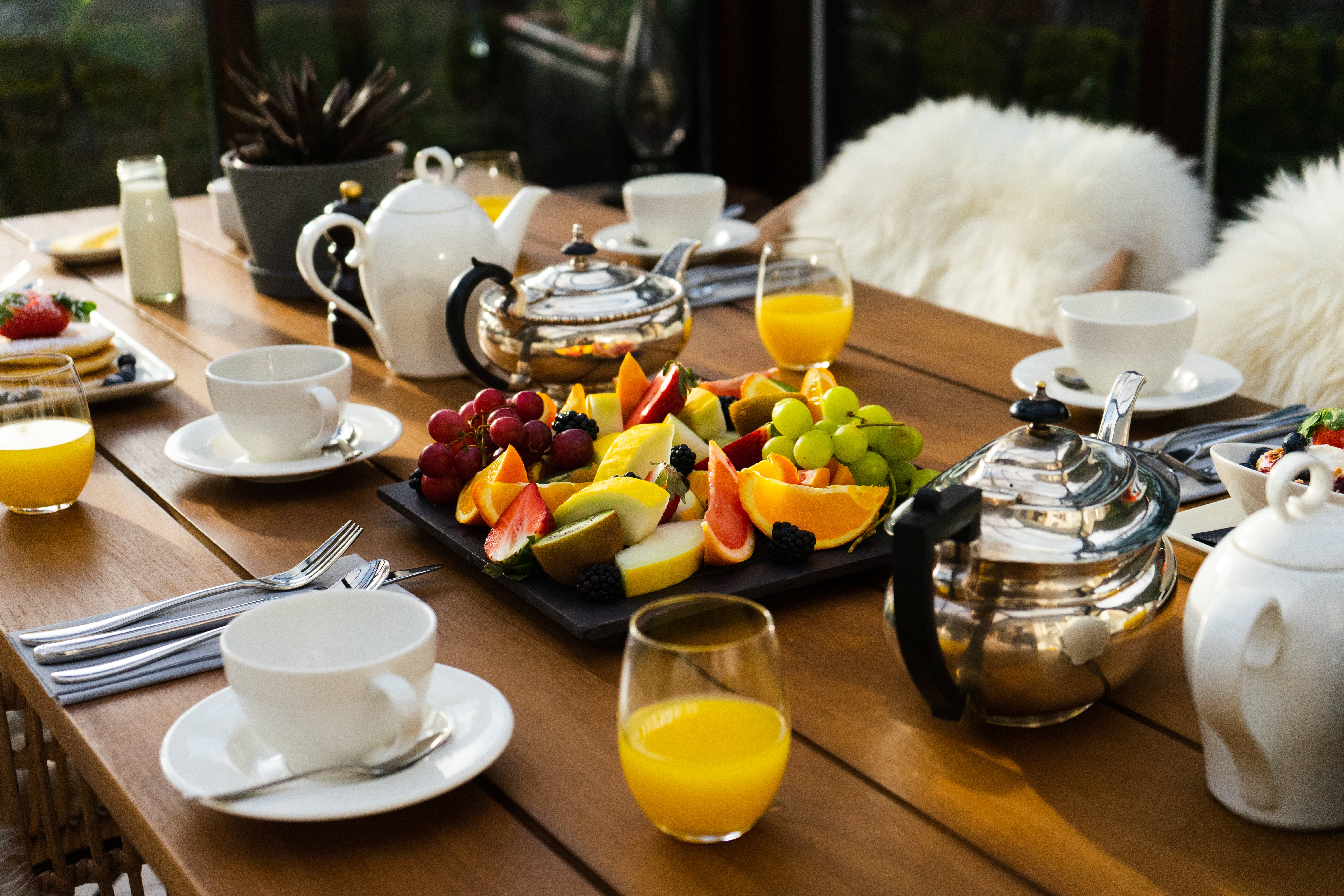 Breakfast table at Club Prive Conservatory, Roseate Edinburgh, ideal for networking events.