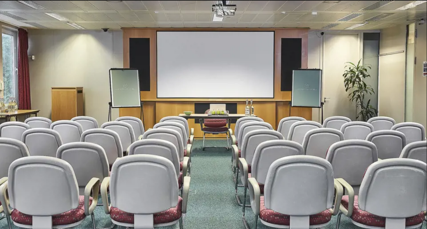 Swallow Meeting Room at Kents Hill Park, featuring comfortable seating for presentations.