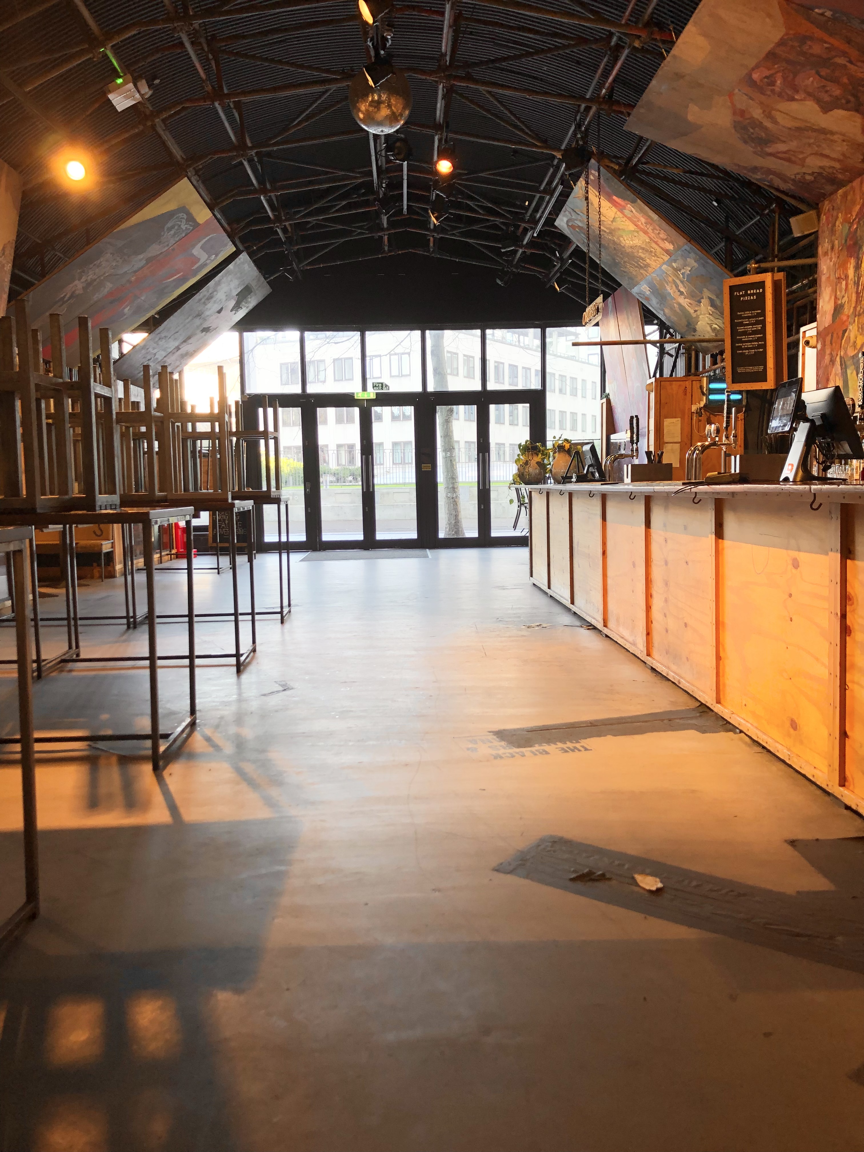 Spacious Arch 1 venue with natural light, ideal for events and gatherings.