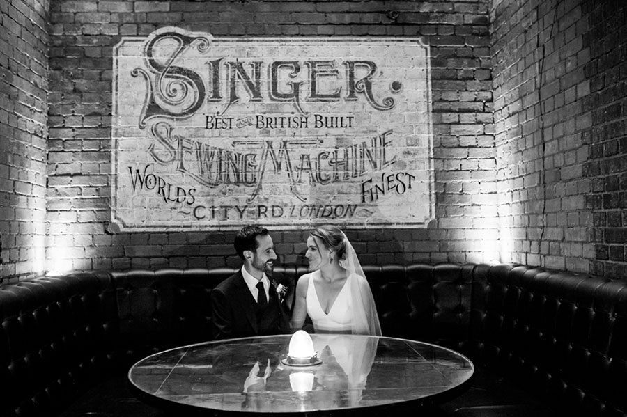 Couple at 5CC Cocktail Bar, intimate setting for weddings and gatherings.