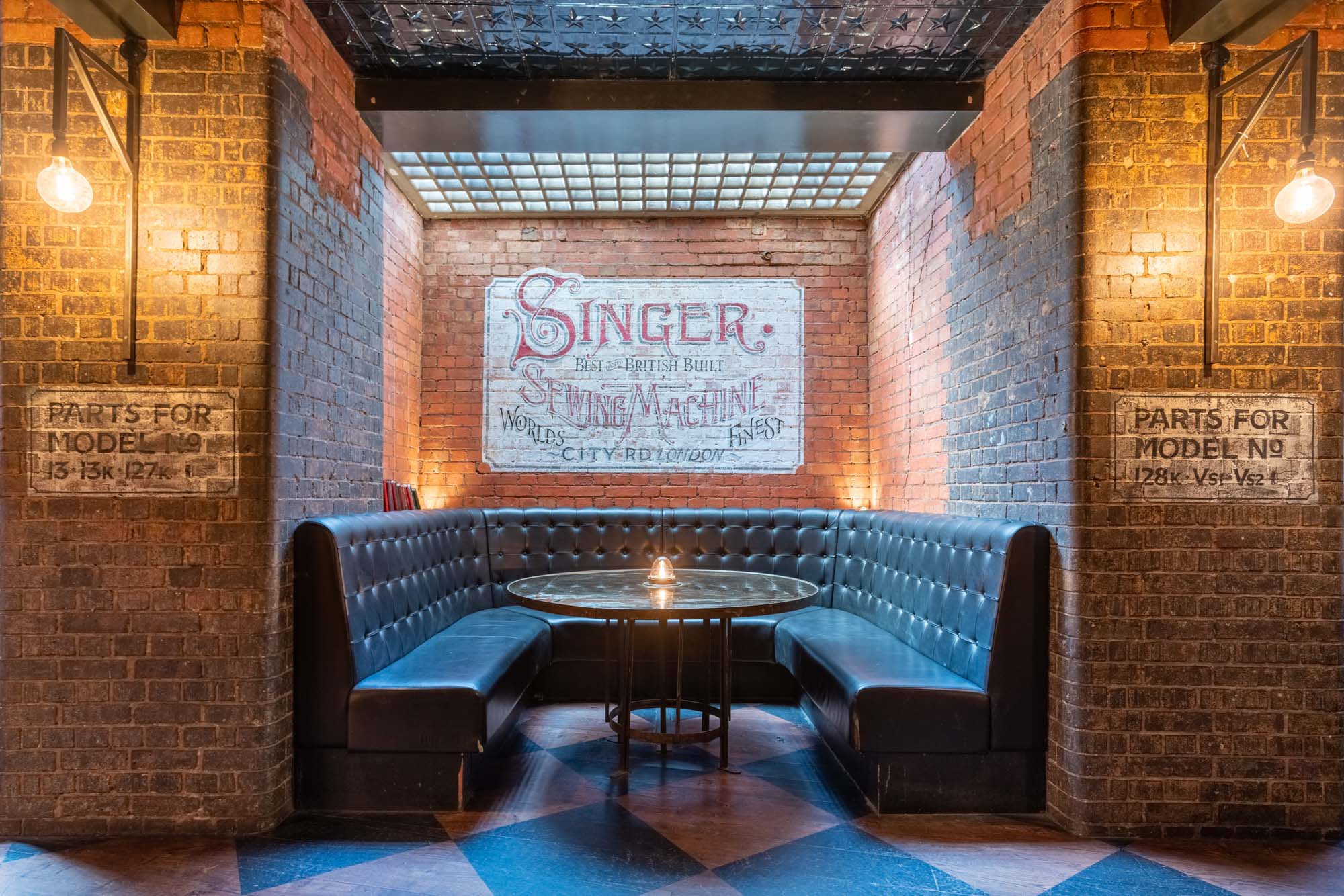 5CC Cocktail Bar seating area with vintage decor, ideal for networking events and meetings.