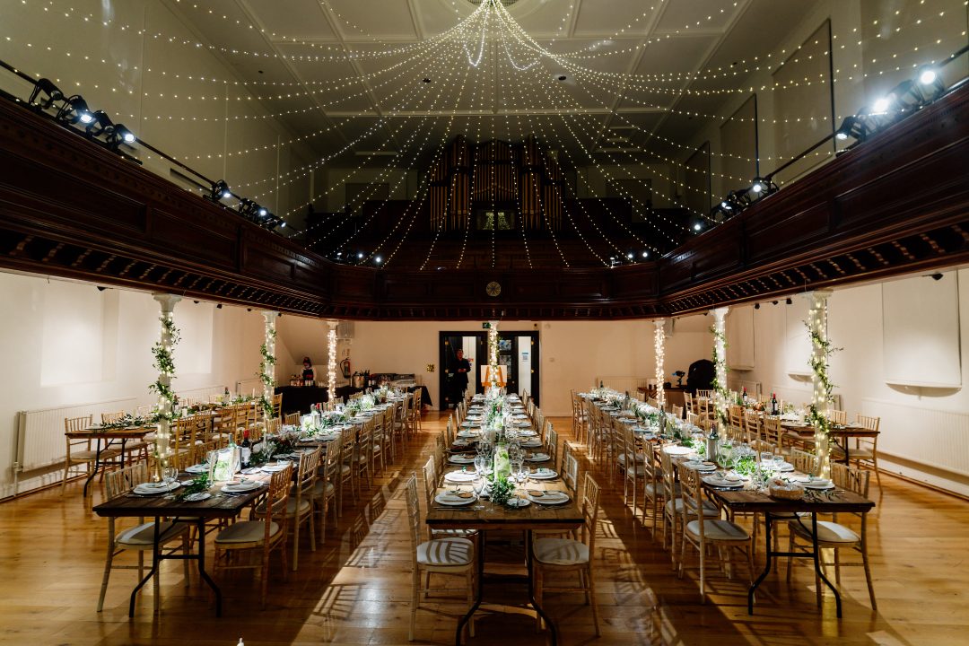 Elegant event space in The Amadeus with floral centerpieces for sophisticated dinners.