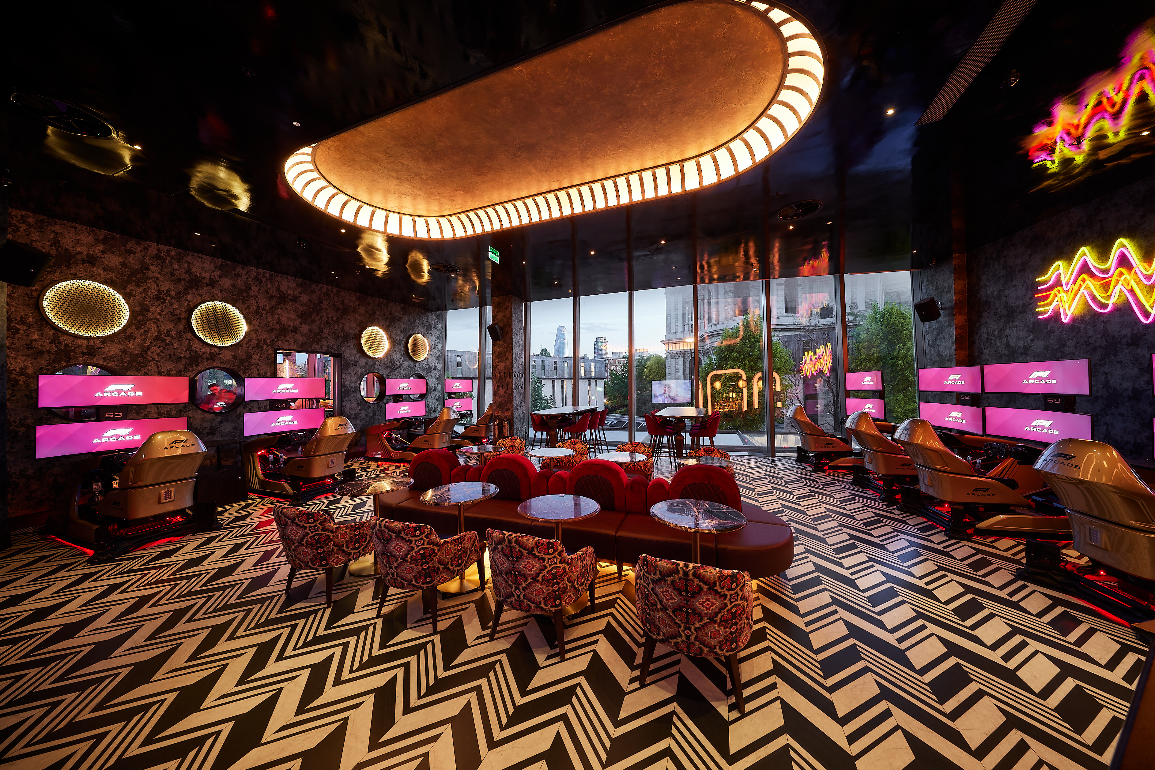 Vibrant F1 Arcade Briefing Room, ideal for networking and social events.