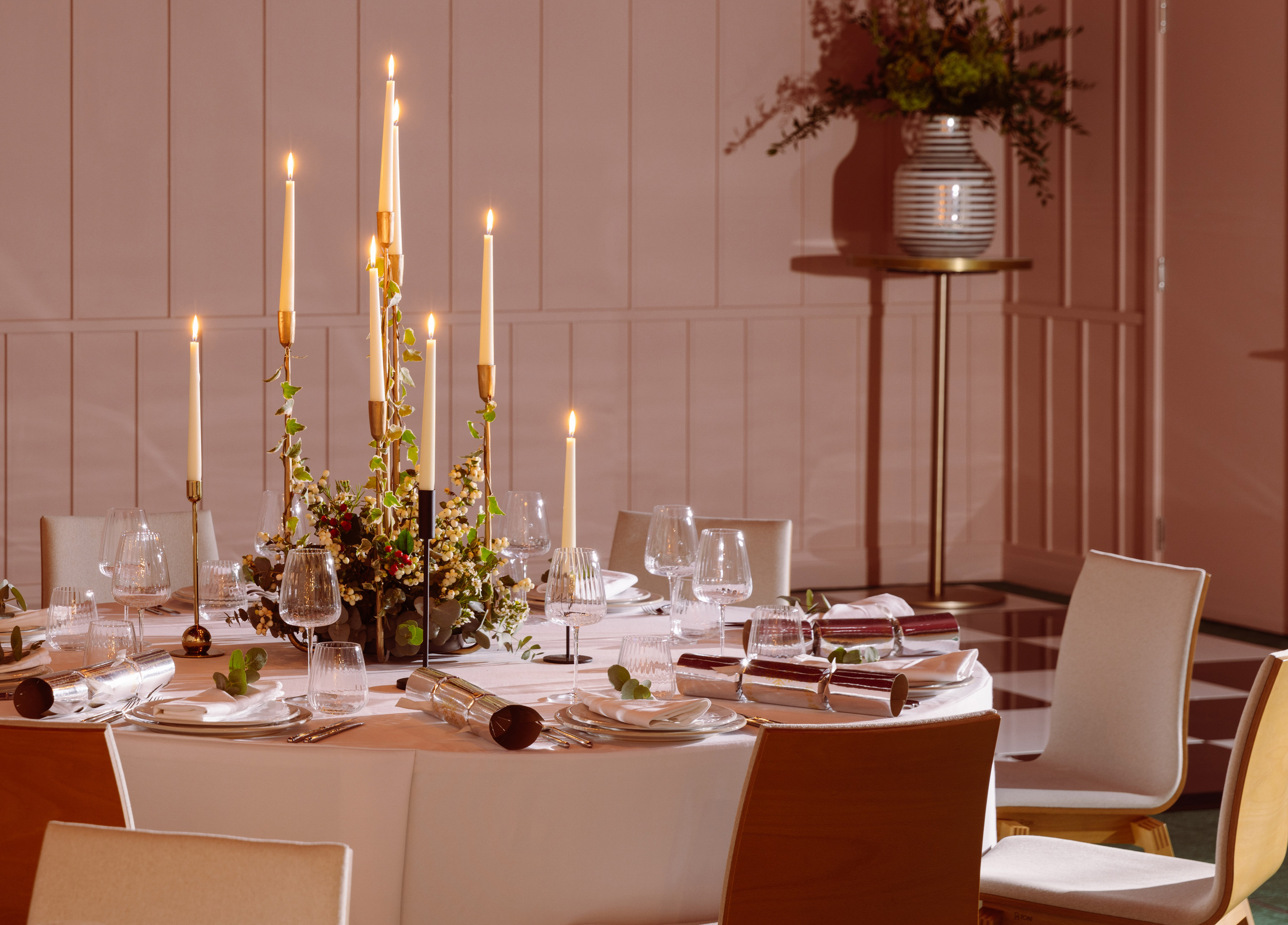 Elegant dining table with candles in Creative Room 1, perfect for formal events.