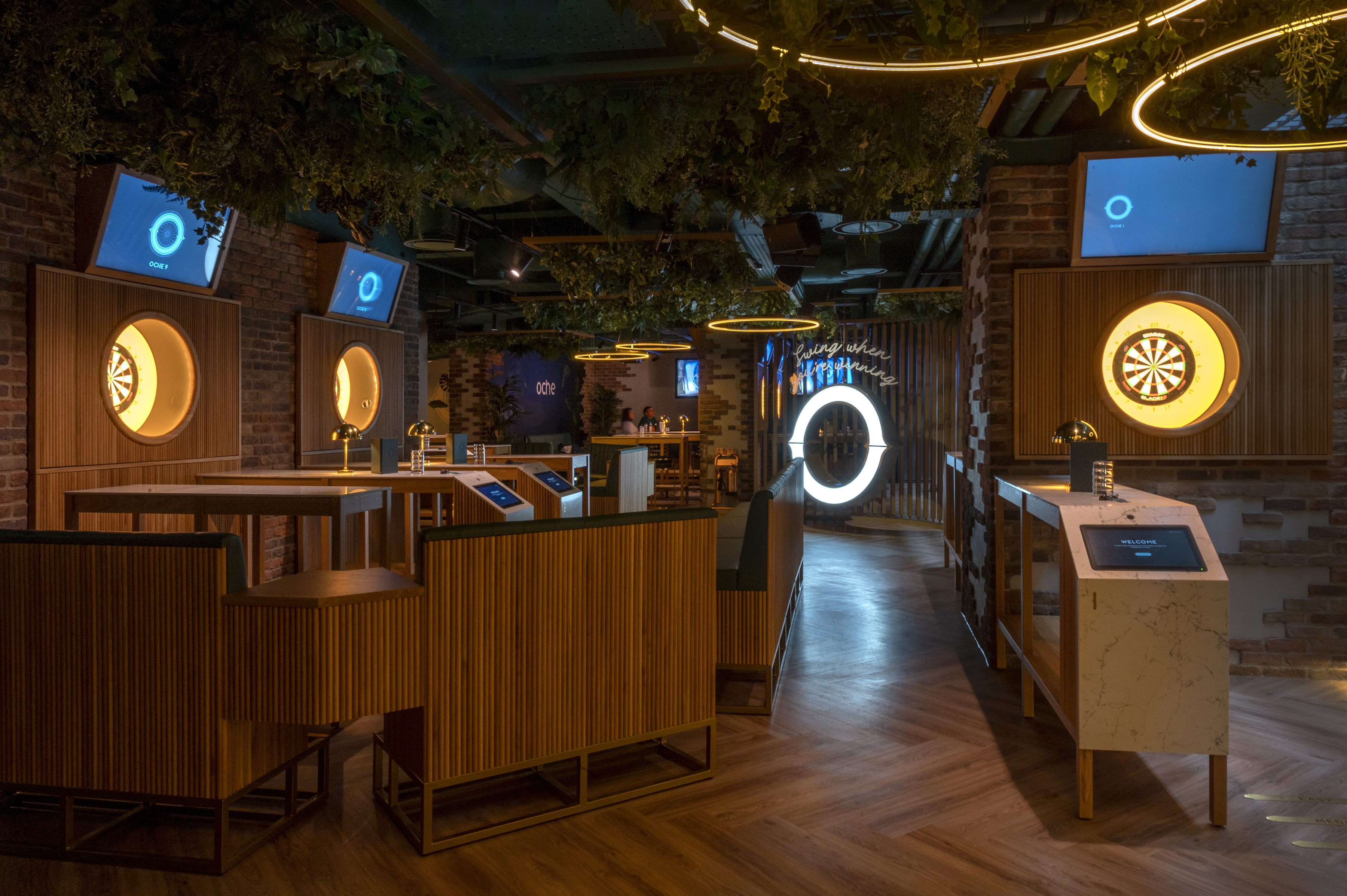 Modern event space in Göteborg Oche with dartboards, ideal for corporate functions and mixers.