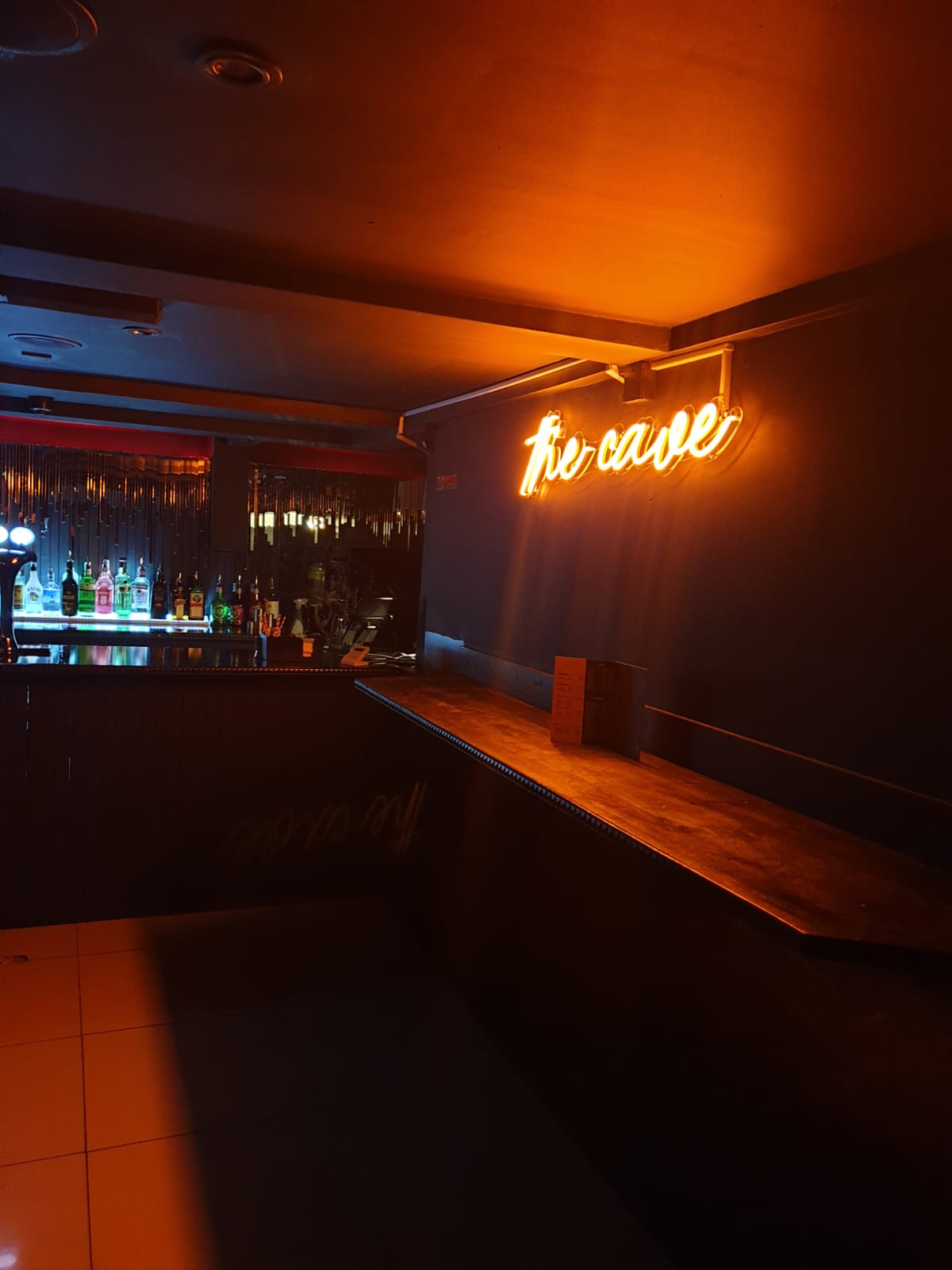 Miniature Restaurant bar with neon sign, perfect for cocktail receptions and networking events.