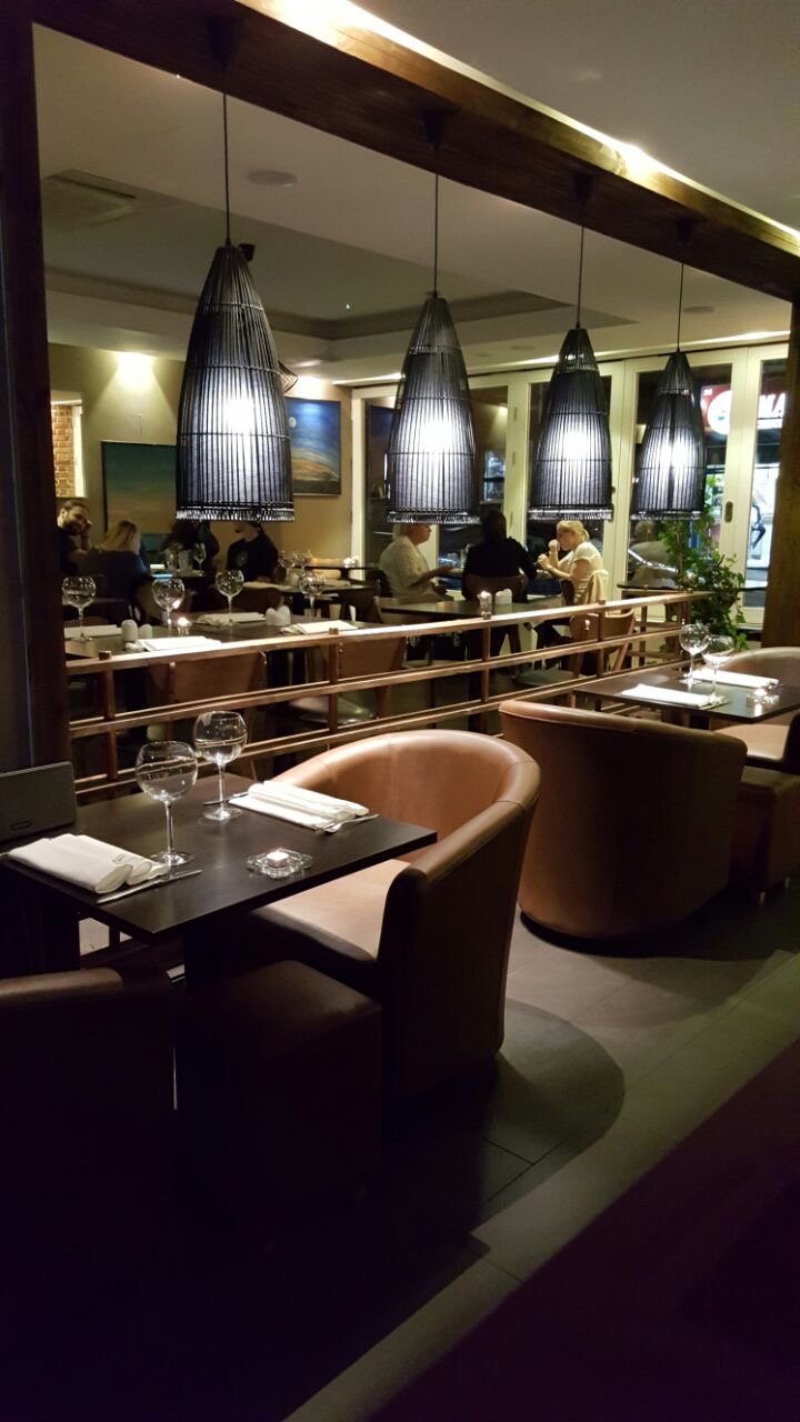 Miniature Restaurant with warm lighting, perfect for intimate gatherings and corporate events.