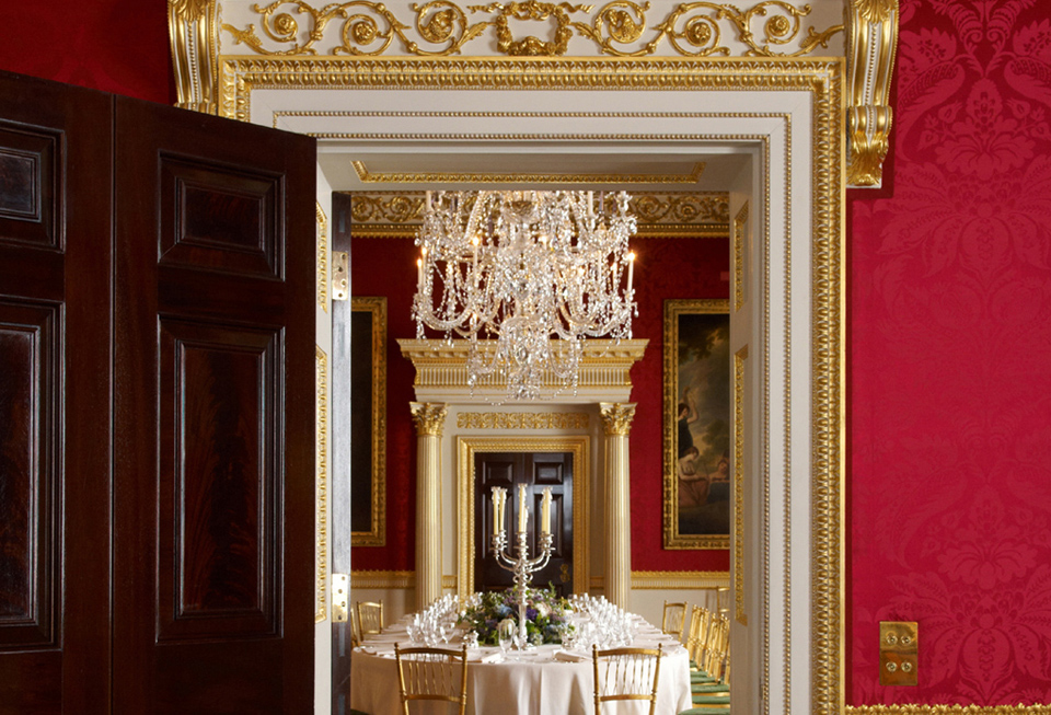 Elegant dining room at Spencer House with chandelier, ideal for formal events and gatherings.